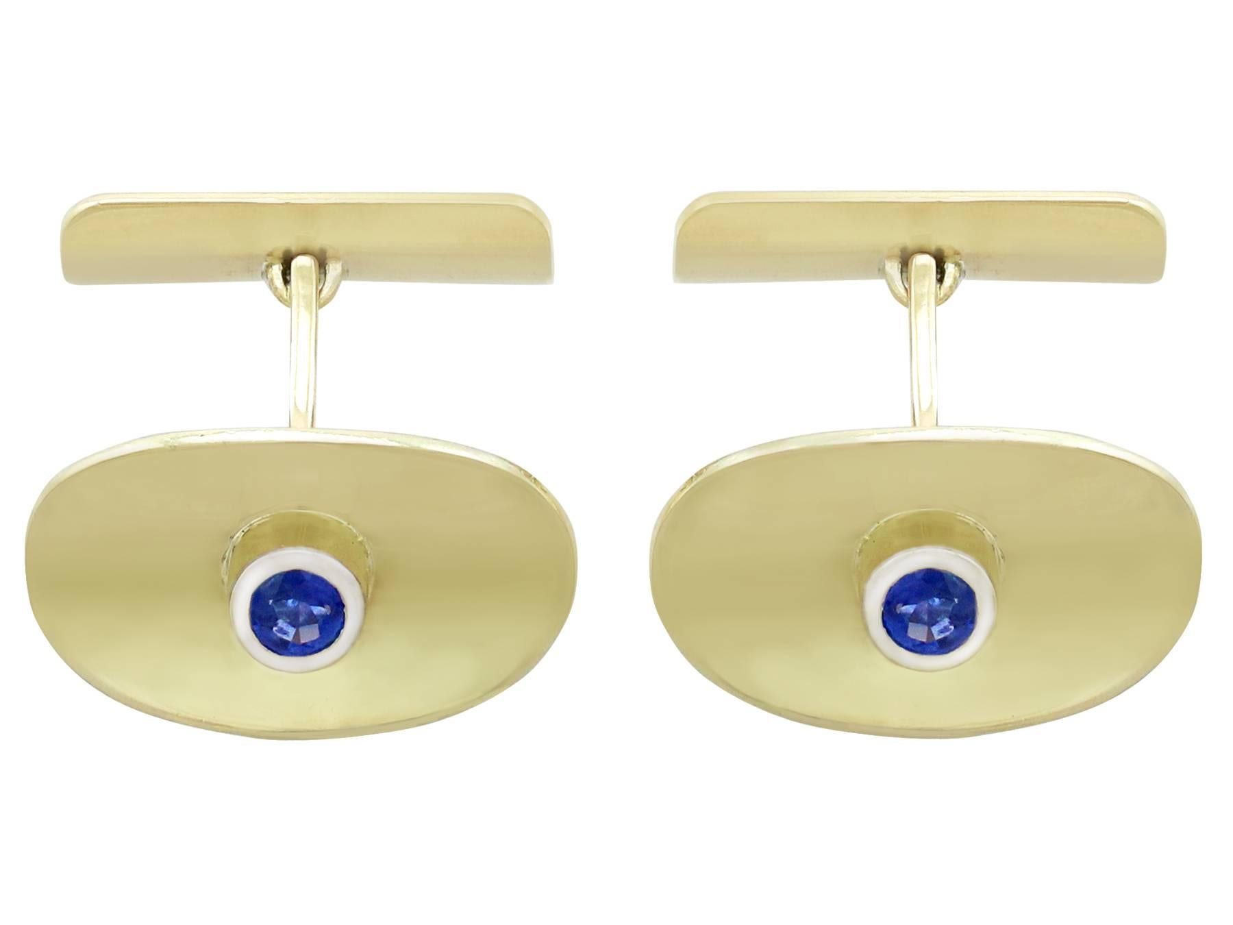 An impressive pair of vintage 1950s 0.59 carat blue sapphire and 14 karat yellow gold cufflinks; part of our diverse sapphire jewelry and estate jewelry collections.

These fine and impressive gold sapphire cufflinks have been crafted in 14k yellow
