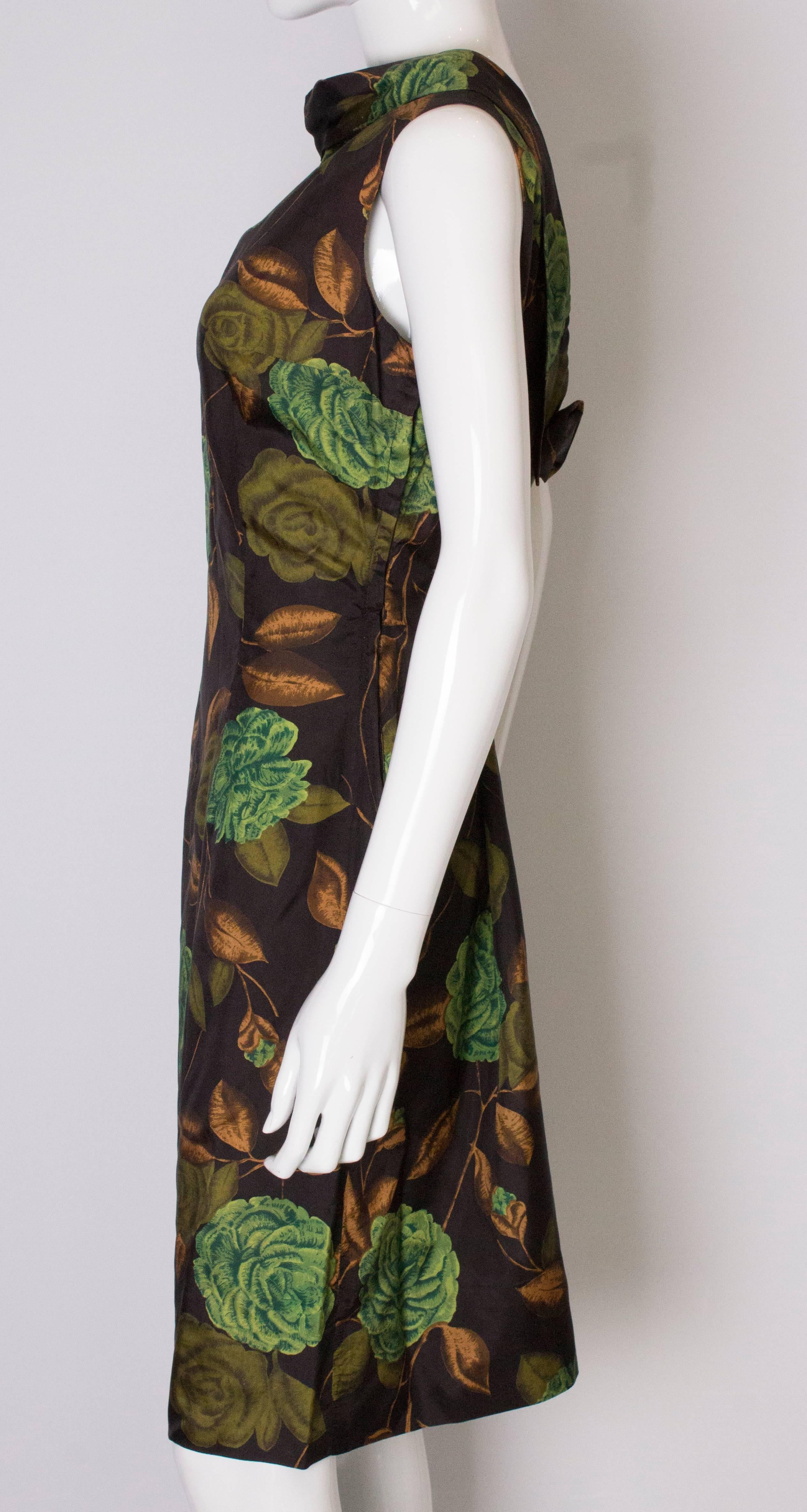 Women's or Men's A Vintage 1950s floral printed wiggle Shift dress