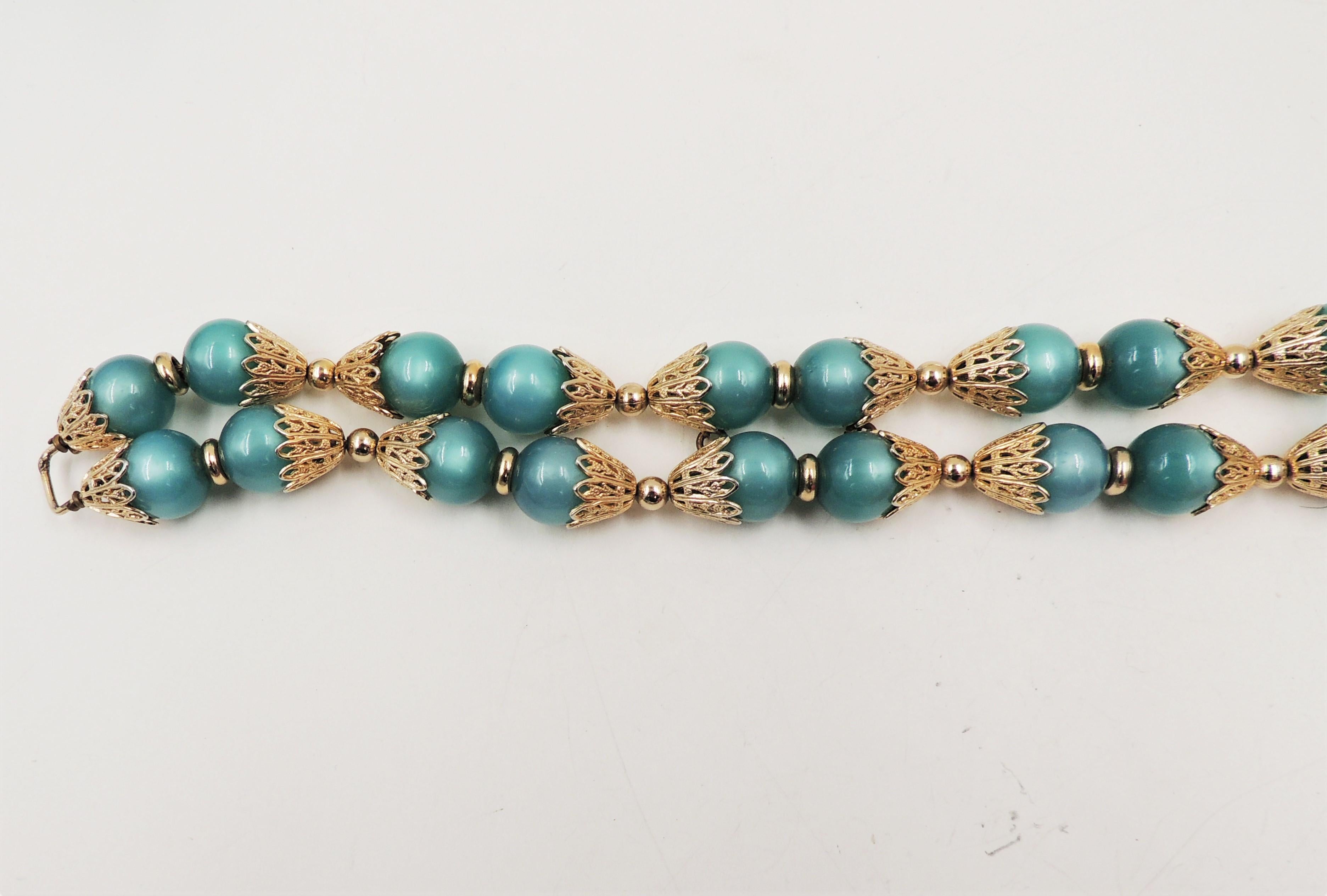 Women's Vintage 1950s Signed Napier Goldtone Green Moonglow Beaded Bracelet For Sale