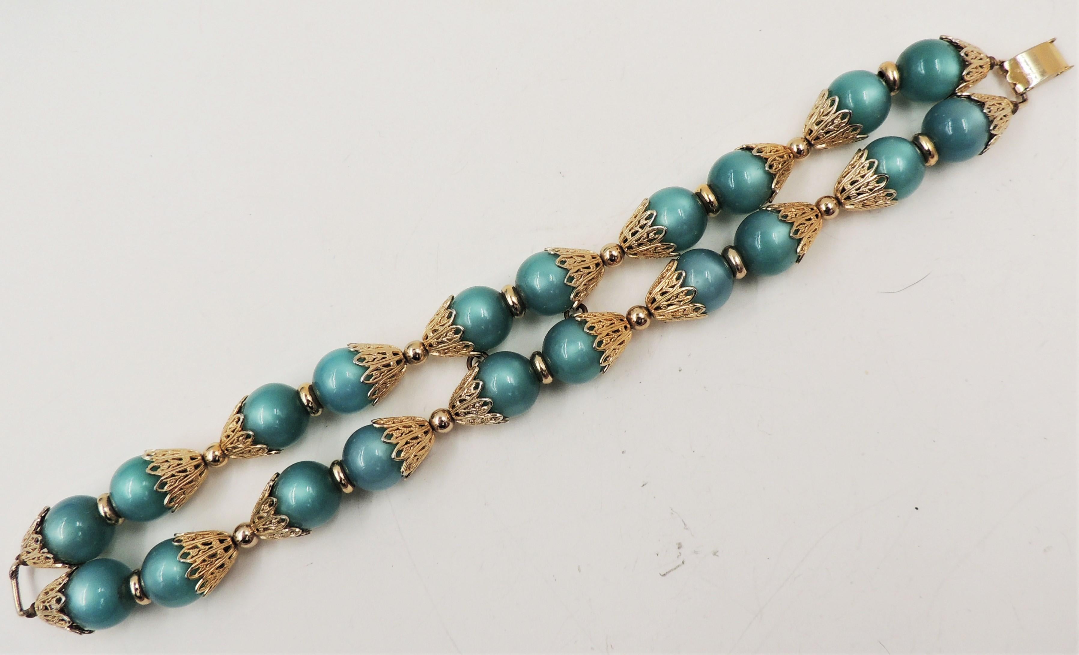 Vintage 1950s Signed Napier Goldtone Green Moonglow Beaded Bracelet For Sale 1