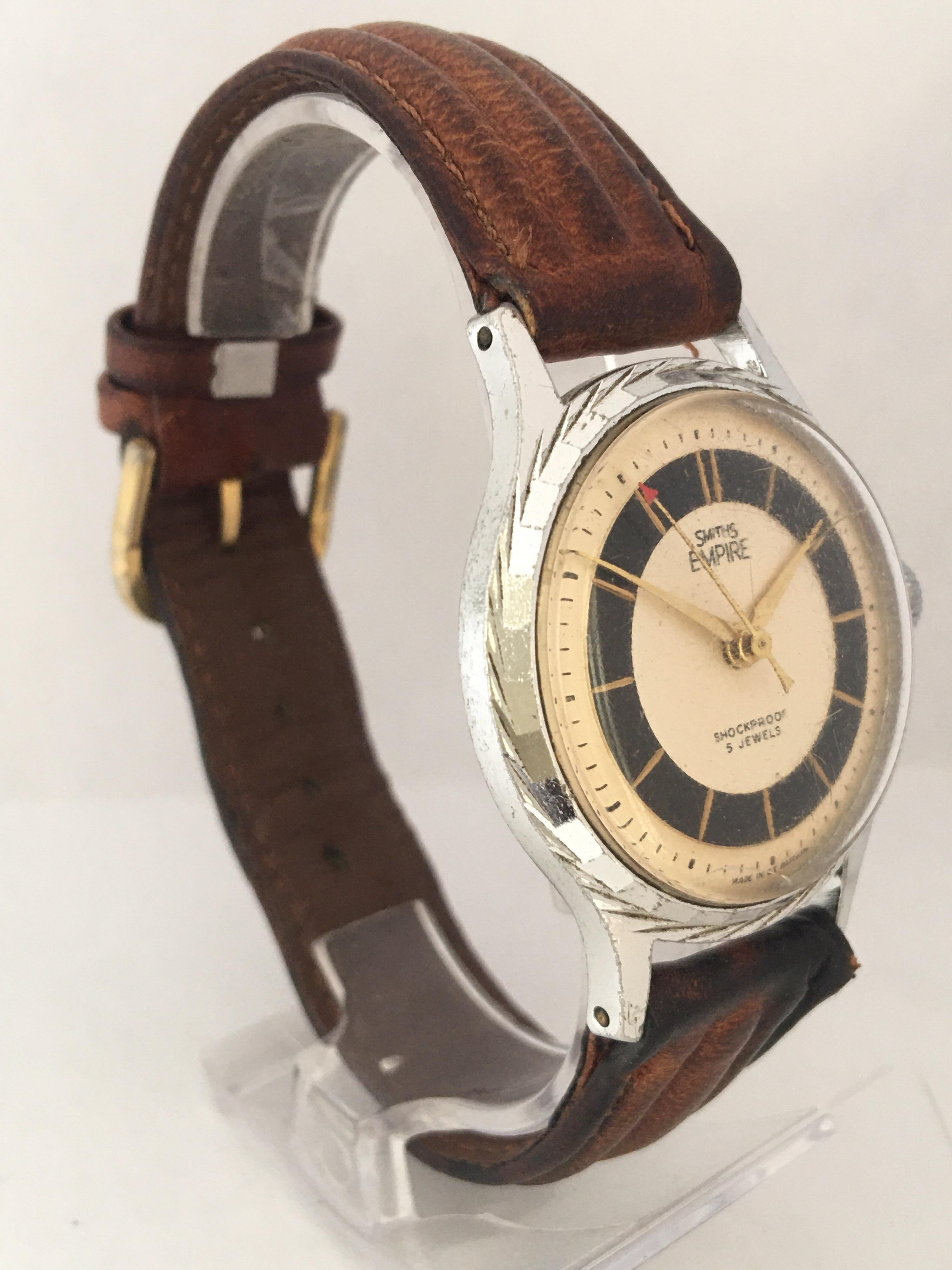 This beautiful vintage hand winding watch is in good working condition and it is running well. Visible signs of ageing and wear with light scratches on the glass and on the watch case as shown. There is a visible crack on the glass between 7 o’clock