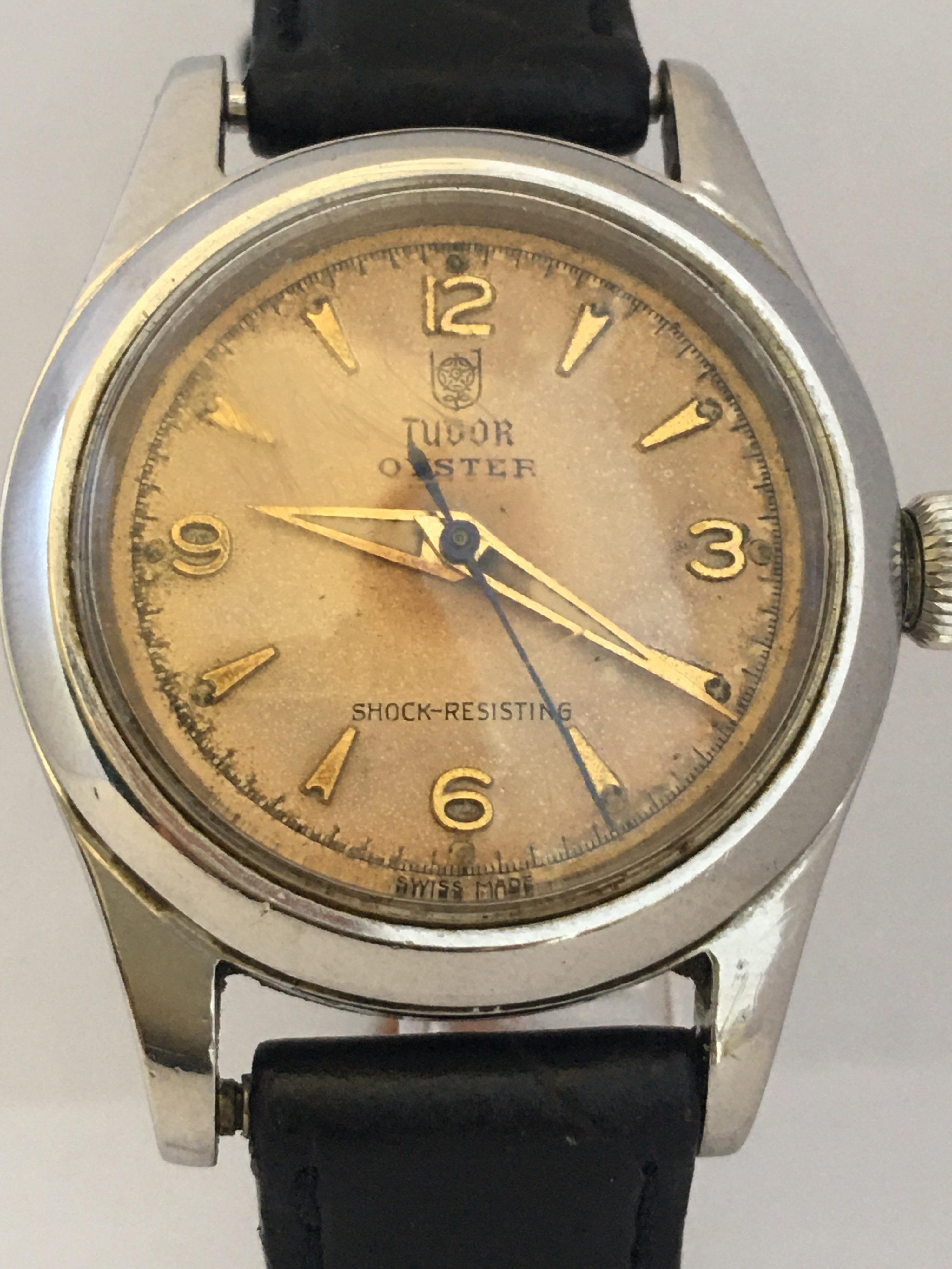 This beautiful pre-owned vintage hand-winding watch is in good working condition and it is ticking well. Visible signs of ageing and wear with light scratches and blemishes on the glass and on the watch case as shown. The dial has aged as shown. The