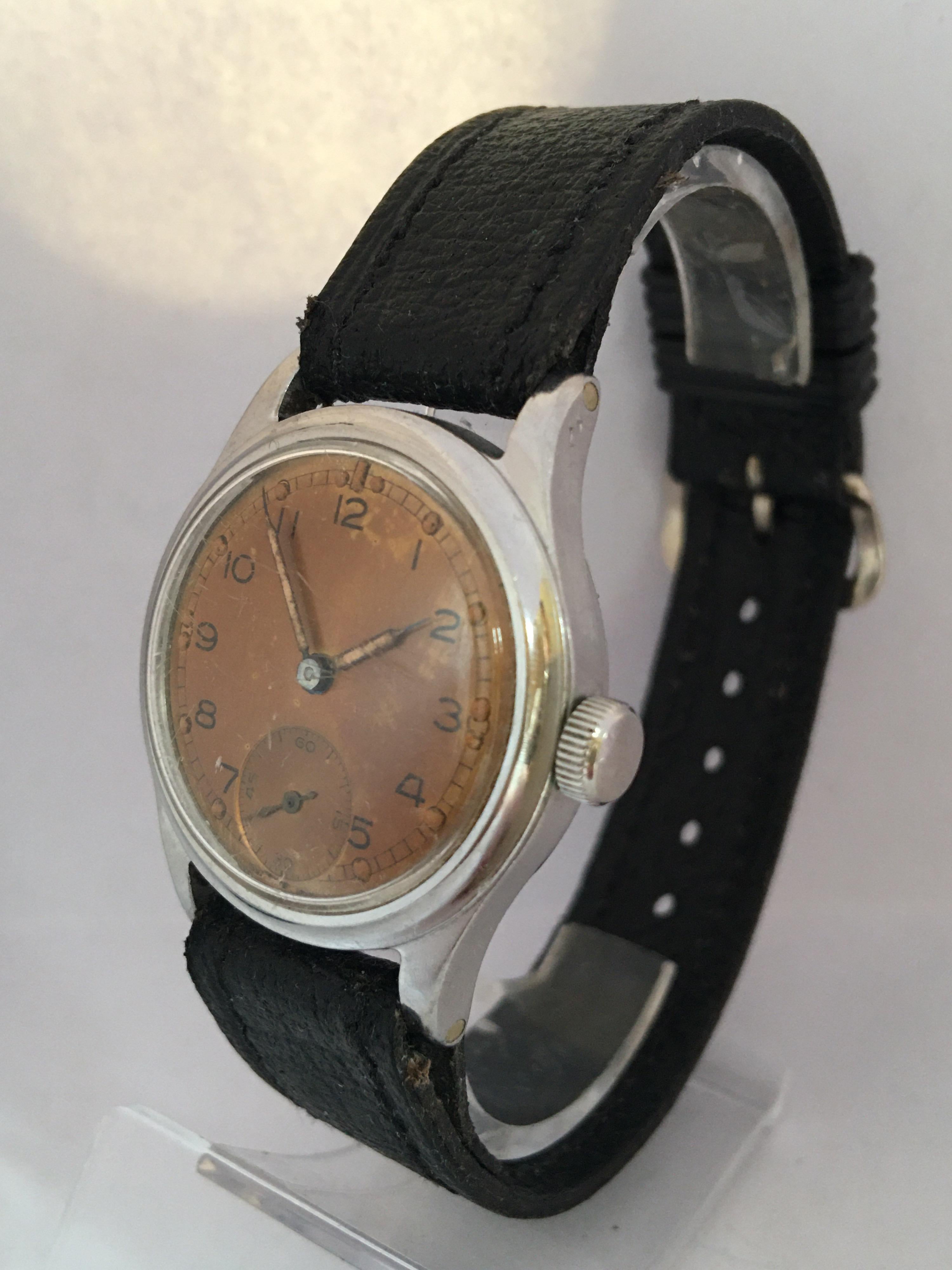 This beautiful pre-owned 32.5mm watch diameter vintage hand winding military watch is in good working condition and it is running (keeps a good time) . Visible signs of ageing and wear with small light marks on the glass surface and on the watch