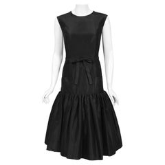 Vintage 1950
s Traina-Norell Couture Black Silk Belted Flounce Cocktail Dress