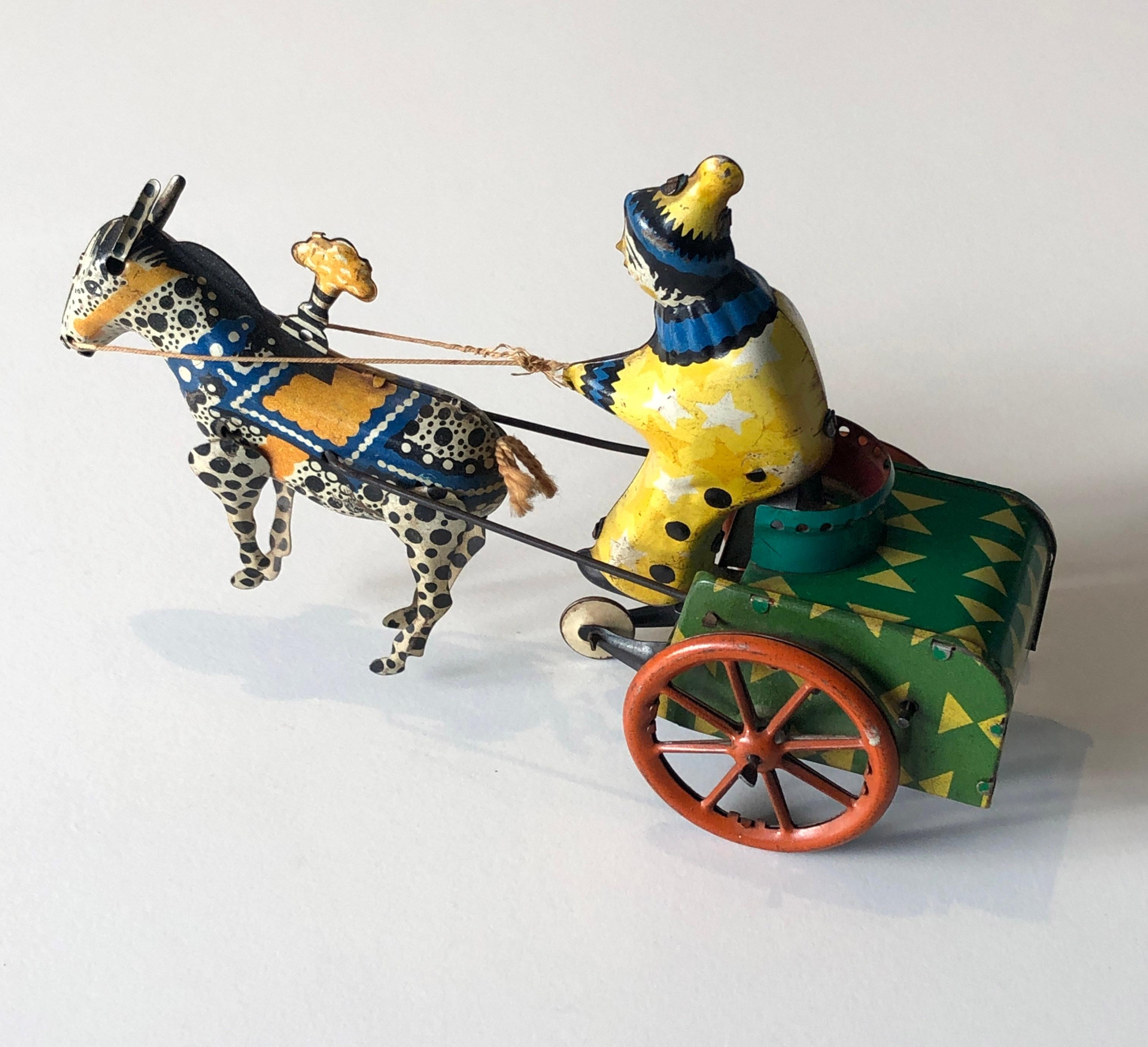 Hand-Crafted Vintage 1950's USSR Tin Windup Donkey Clown Carriage Toy For Sale