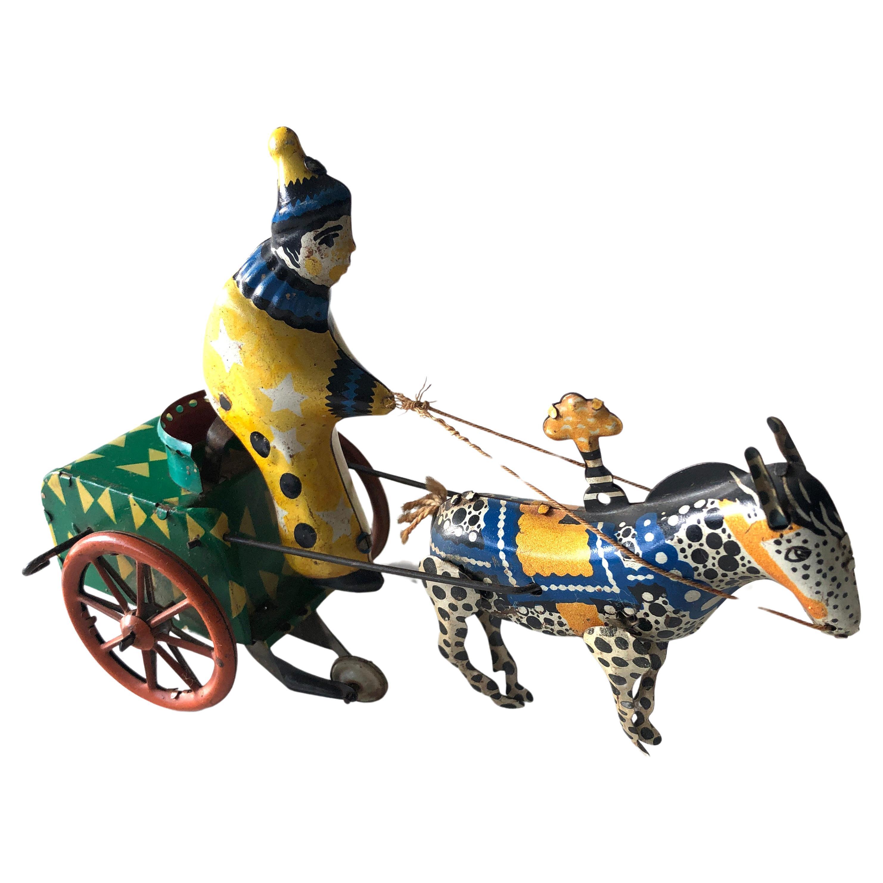 Vintage 1950's USSR Tin Windup Donkey Clown Carriage Toy For Sale