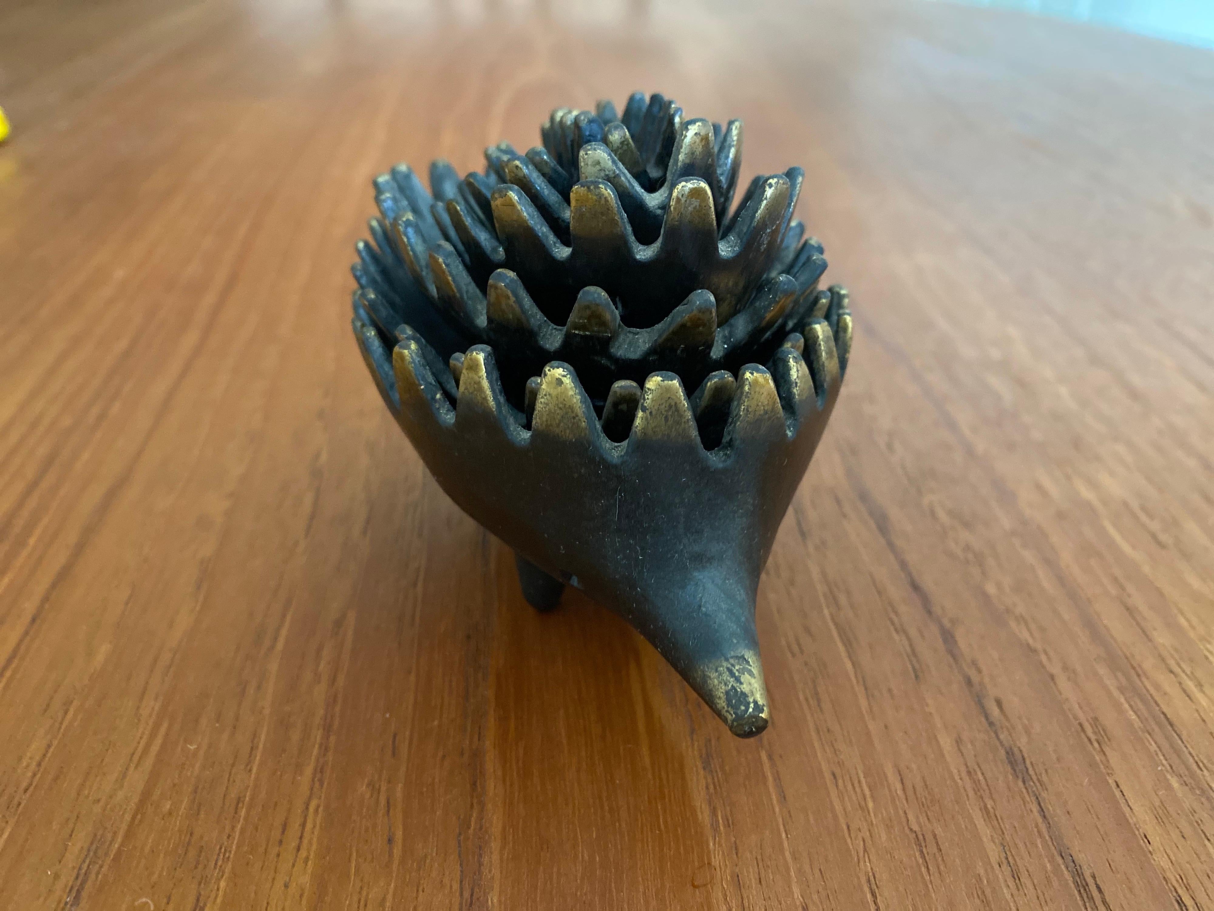 Mid-century Walter Bosse hedgehog stackable ashtray in original condition made in Austria. This vintage ashtray includes all six trays and is in good condition.