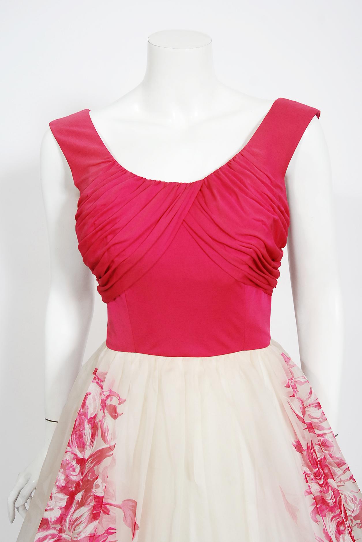 An absolutely exquisite 1950's magenta silk jersey hand-painted printed dress once owned by the talented Yma Sumac. Yma Sumac (1922–2008) was a noted Peruvian soprano and the original Queen of Exotica. Her International fame began in the early