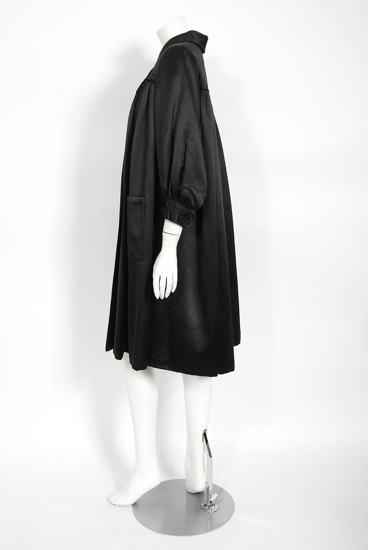 Women's Vintage 1951 Traina-Norell Couture Black Duchess Satin Voluminous Pleated Coat For Sale