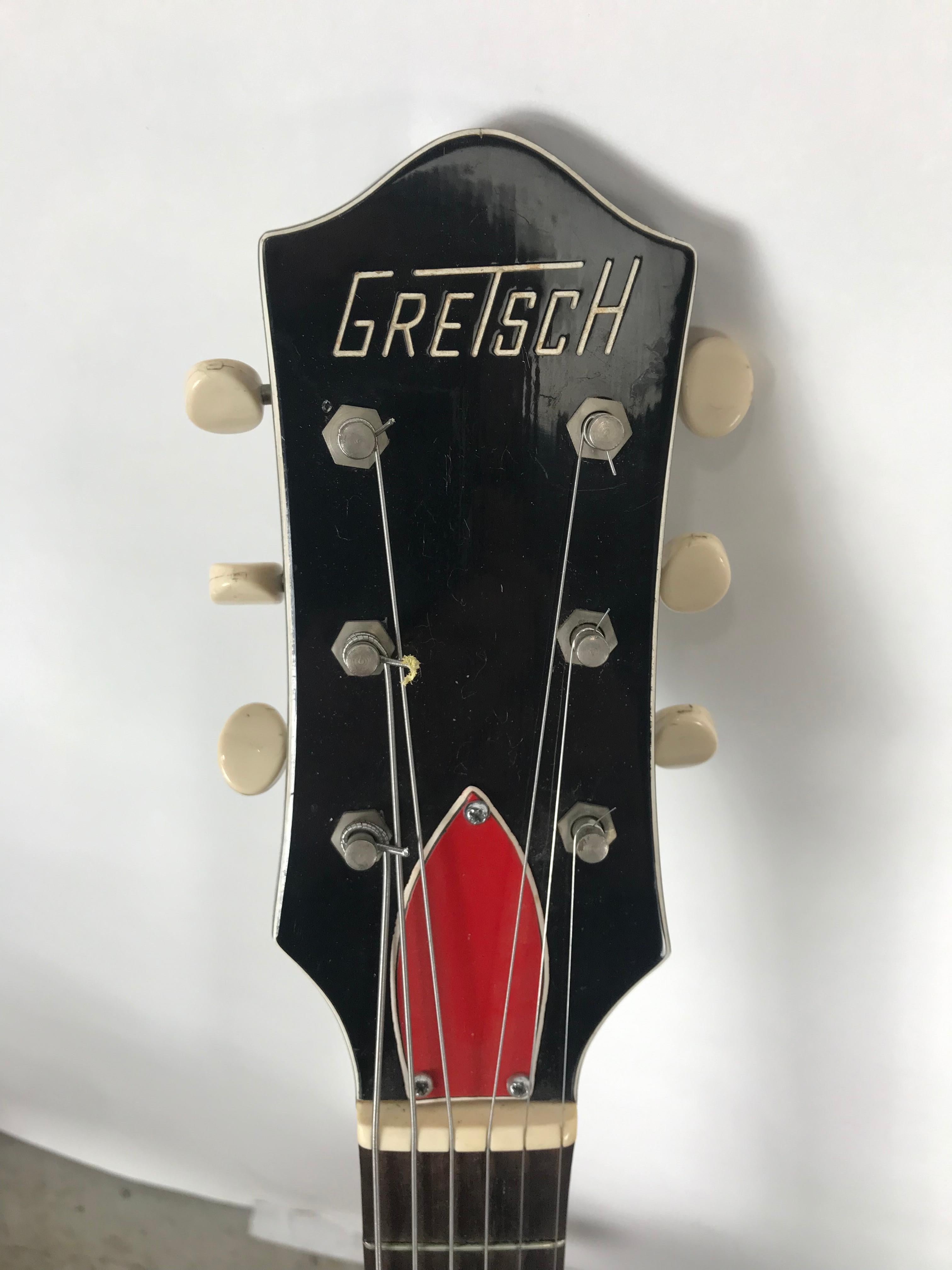 Vintage 1957 Gretsch Rambler model 6115 hollow body electric guitar with original hard shell case. DeArmond pickup. Ivory lacquer finish, black back, close to mint, showroom condition, sounds and plays amazing, low action, perfect intonation,