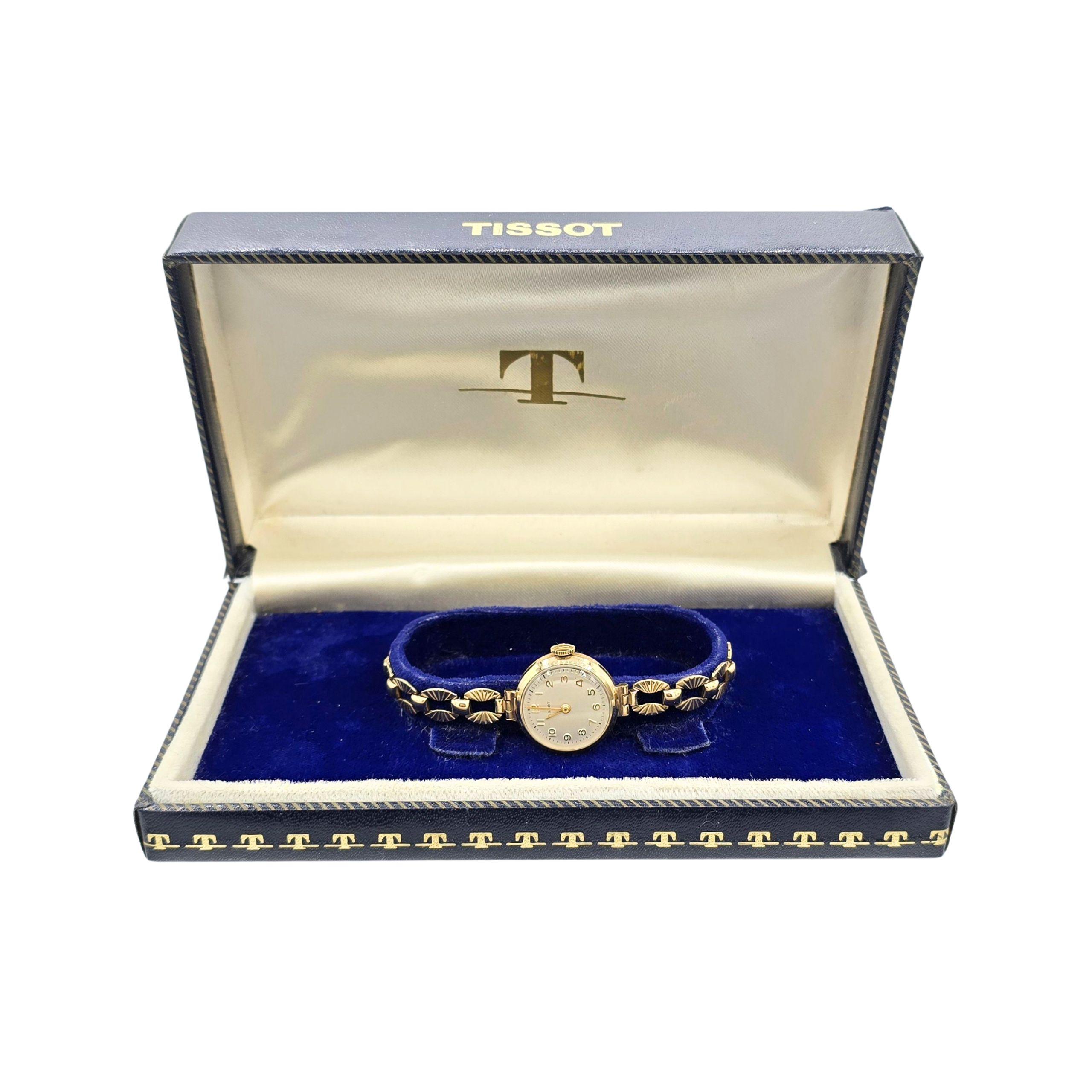 A very rare 1957 model Tissot ladies watch with a decorative bracelet strap.  It is made in solid 9k yellow gold.  We are able to accurately date this as it has full UK hallmarks, dating this to 1957 and certifying its 9k gold make.

The
