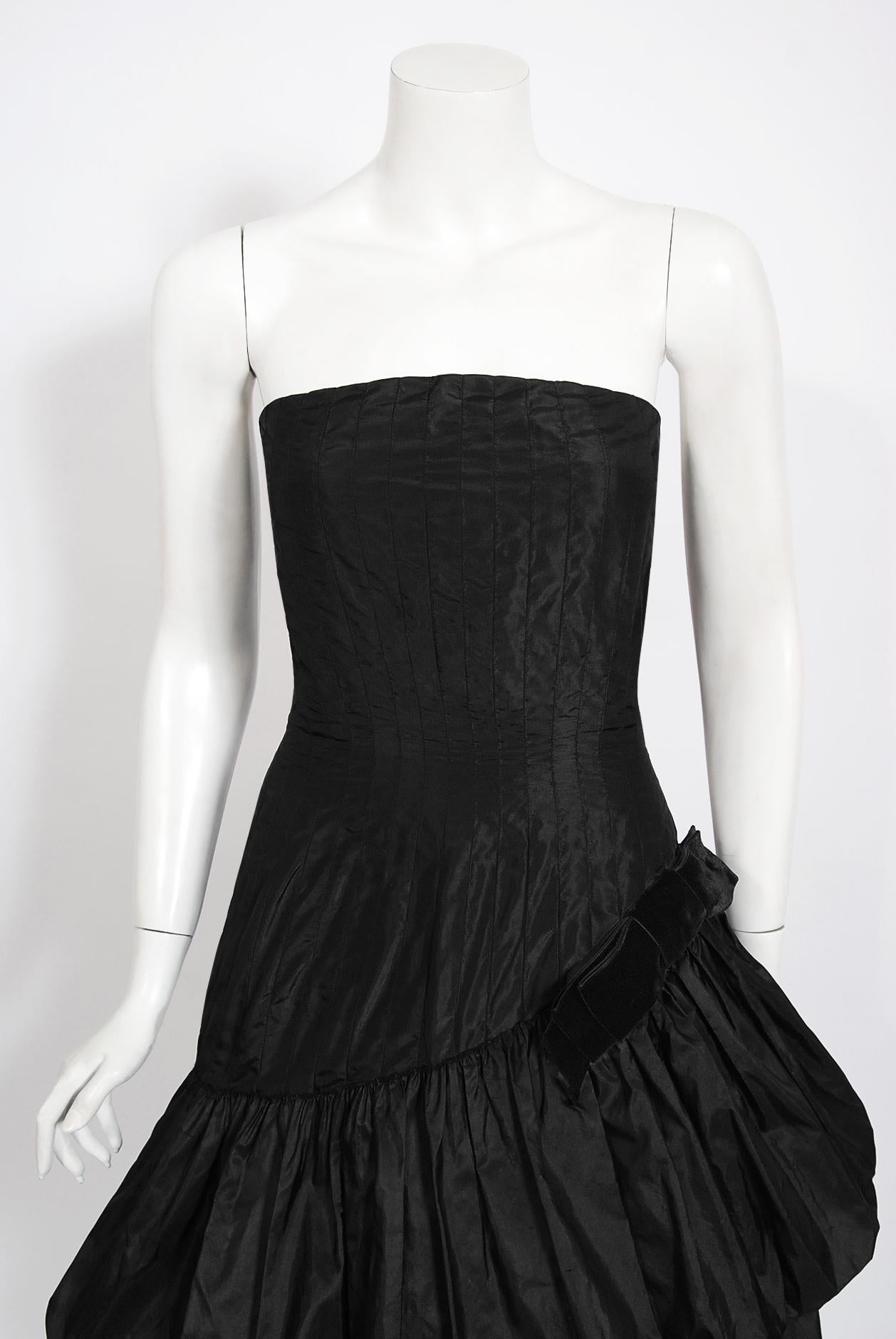 Stunning and highly seductive Old England of Bruxelles custom-made couture cocktail dress dating back to 1959. The client's name label, Mrs. Paliser, is still attached and the amazing construction looks to resemble a famous Yves Saint Laurent for