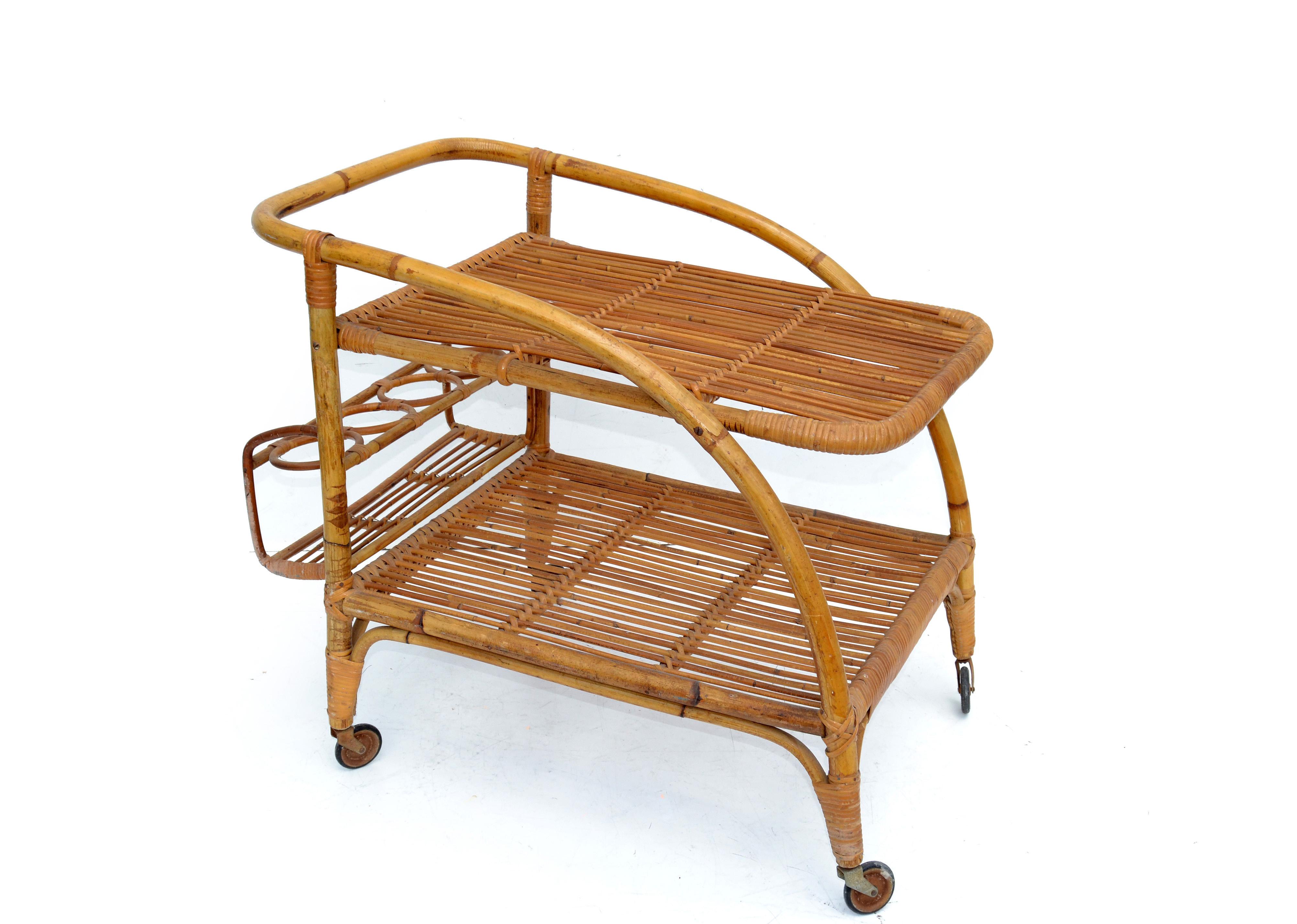 Vintage 1960 2 tiers French bamboo and rattan bar cart.
Space in between 11 inches.
