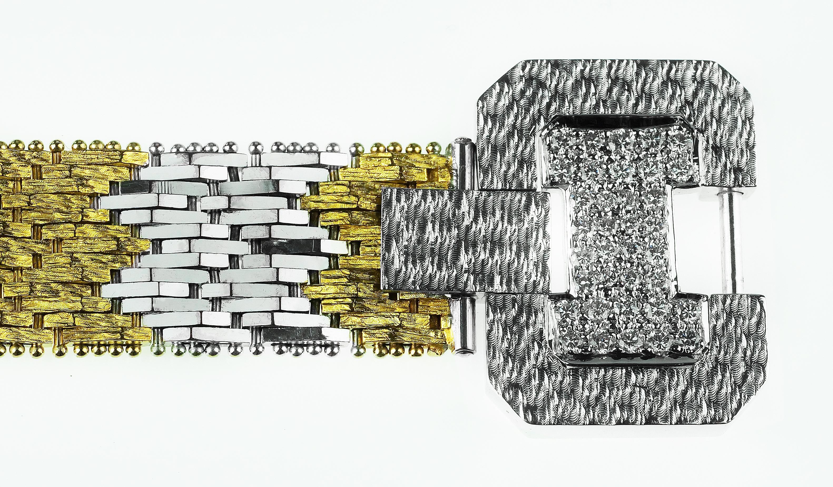 Exquisite, one of a kind, vintage bracelet in yellow and white gold with waves sequences creating the band which is completed with round brilliant cut diamonds set buckle clasp.

36 x round brilliant cut diamonds, approximate total weight 0.65