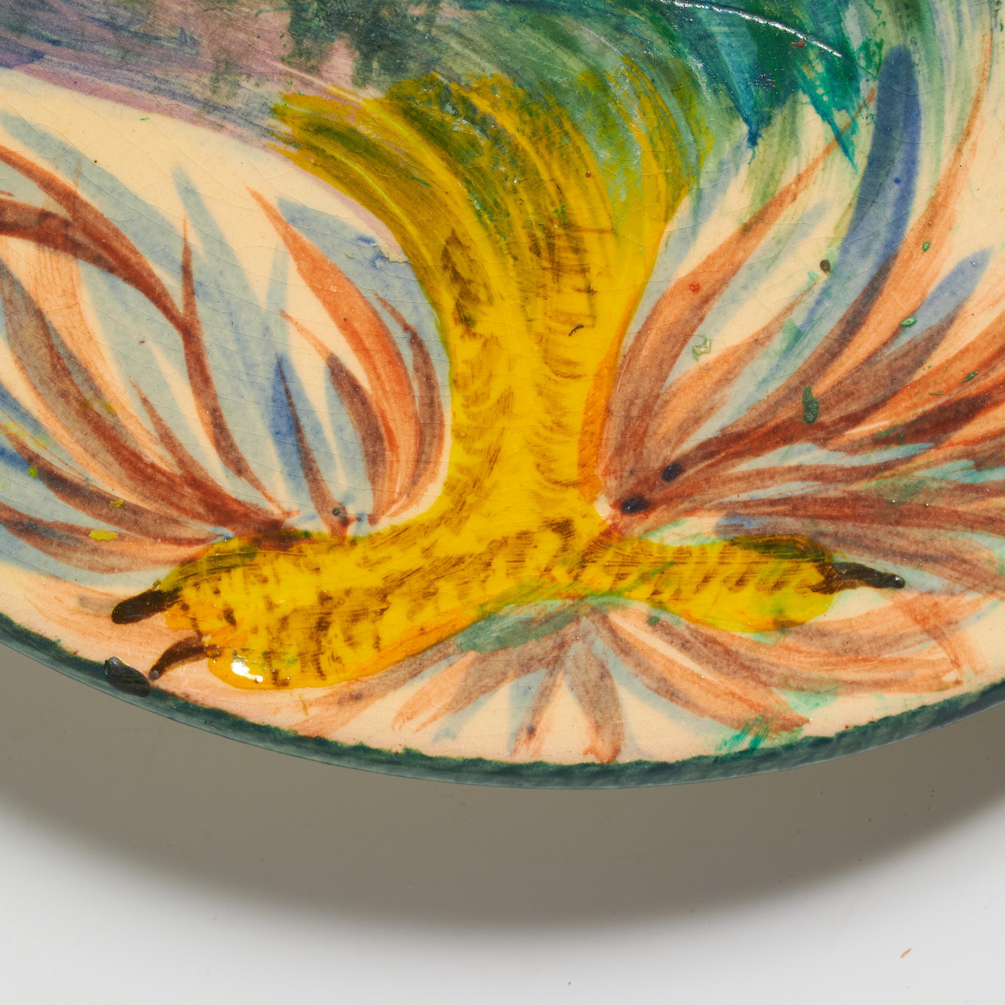 Plato de cerámica vintage de 1960 pintado a mano en azul y naranja por el artista Díaz Costa Cerámico en venta