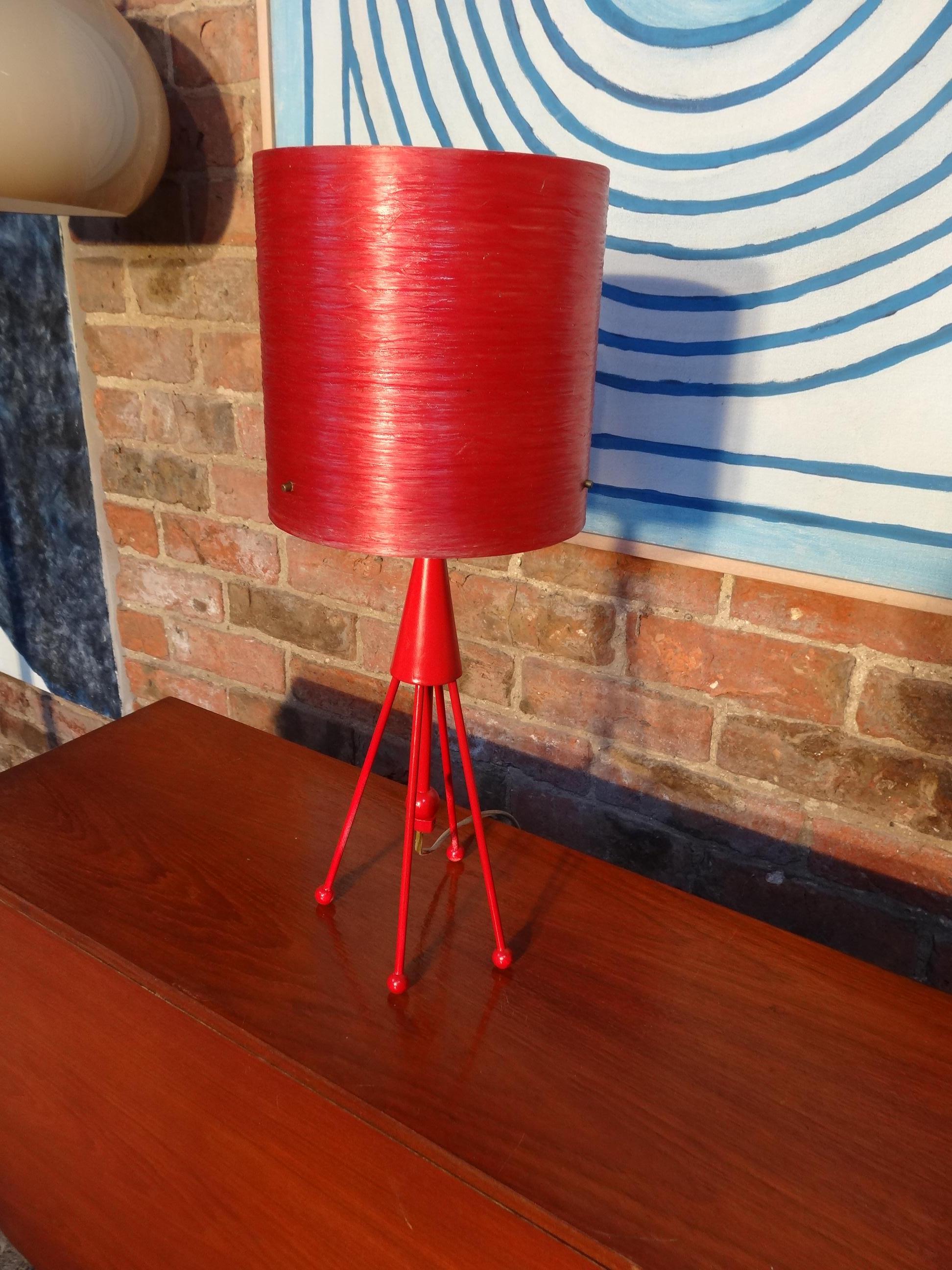 Vintage 1960 super retro metal red 'rocket' table lamp, It comes with it's original plastic lampshade which creates a great light effect. 

Measures: Height 53cm, depth 20cm, width 20cm.

  