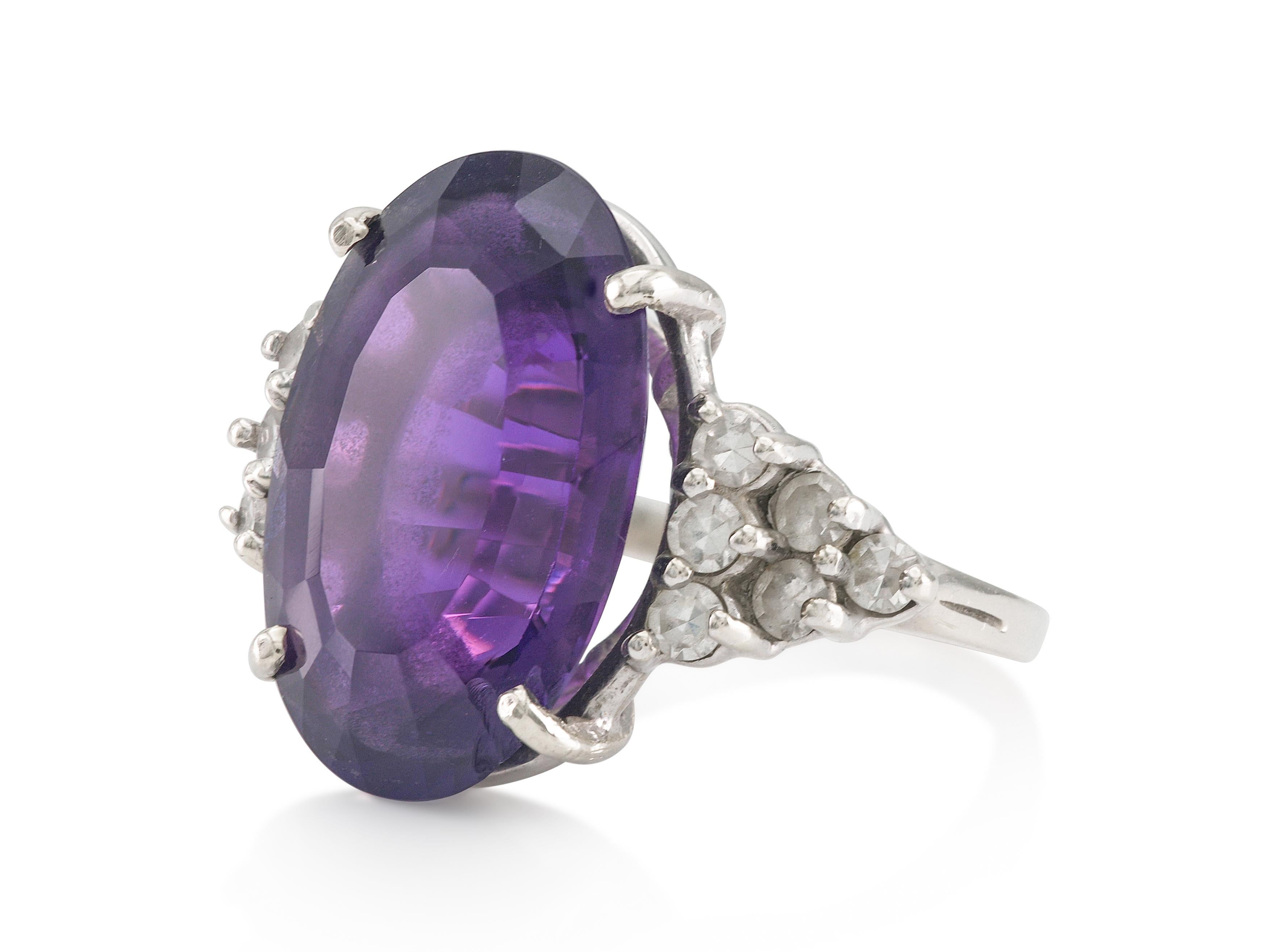 Finely crafted in 14k white gold with an Oval cut Amethyst weighing approximately 10.00 carats and small Round cut Diamonds.
Circa 1960s
Size 4, resizable