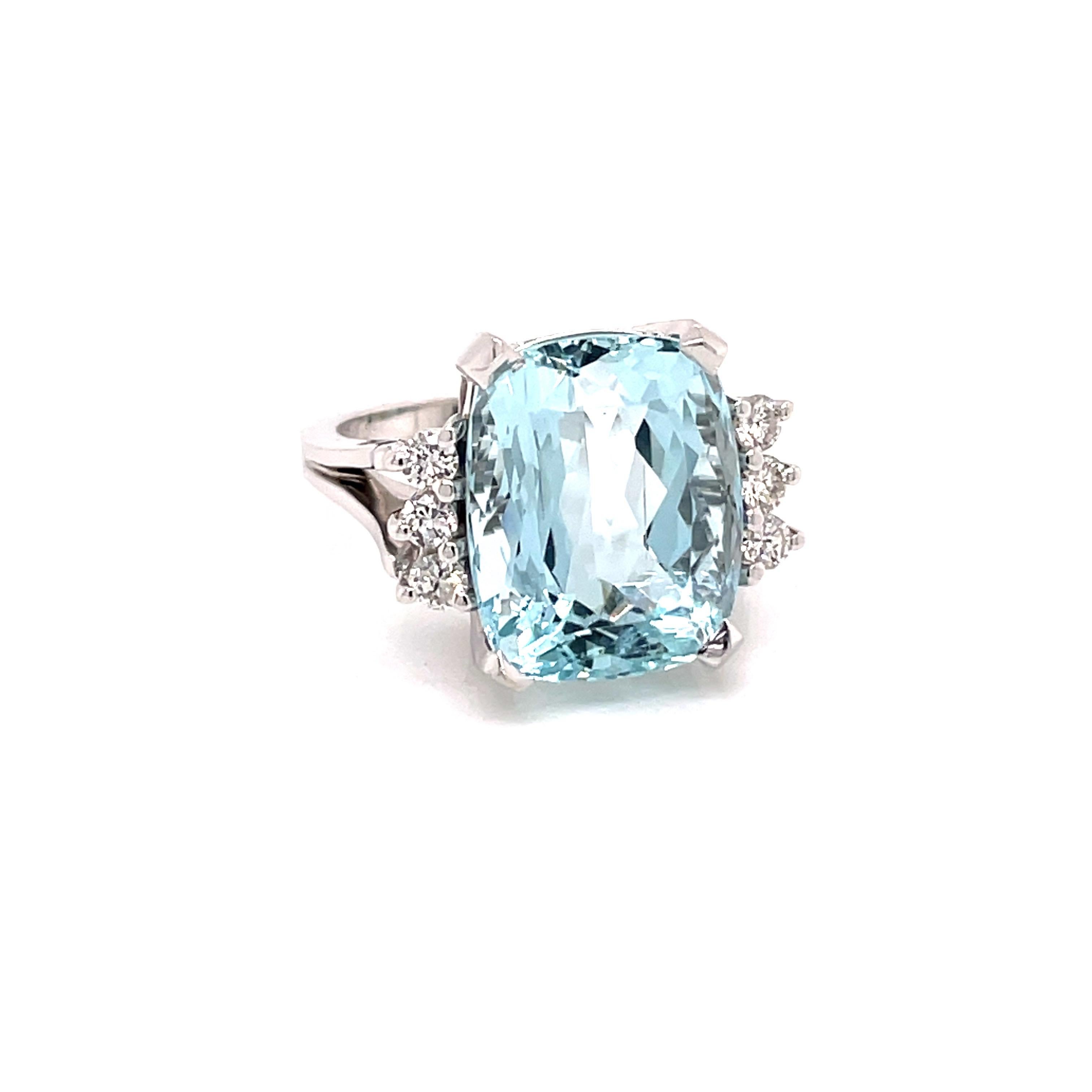 Vintage 1960's 10ct Cushion Cut Aquamarine Ring with Diamonds - The aquamarine weighs approximately 10ct and measures 14.4 x 11.7mm.  It is accented with 6 round brilliant diamonds weighing approximately .36ct G - H color and VS2 - SI1 clarity.  