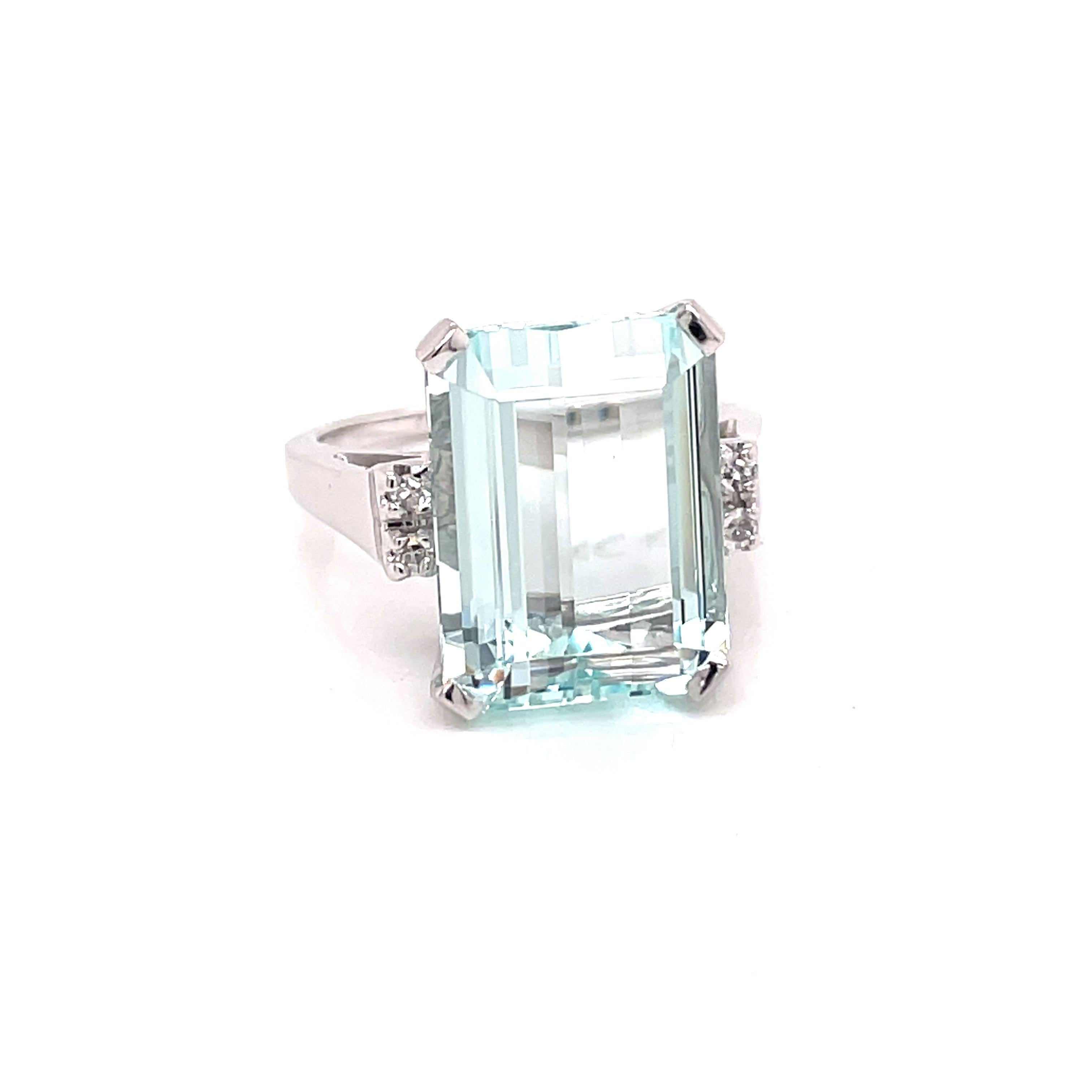 Vintage 1960's 10ct Emerald Cut Aquamarine ring with Diamonds - The aquamarine weighs approximately 10ct and measures 16 x 12mm.  It is accented with 4 single cut diamonds weighing approximately .08ct H - I color SI clarity.  The setting is 14k