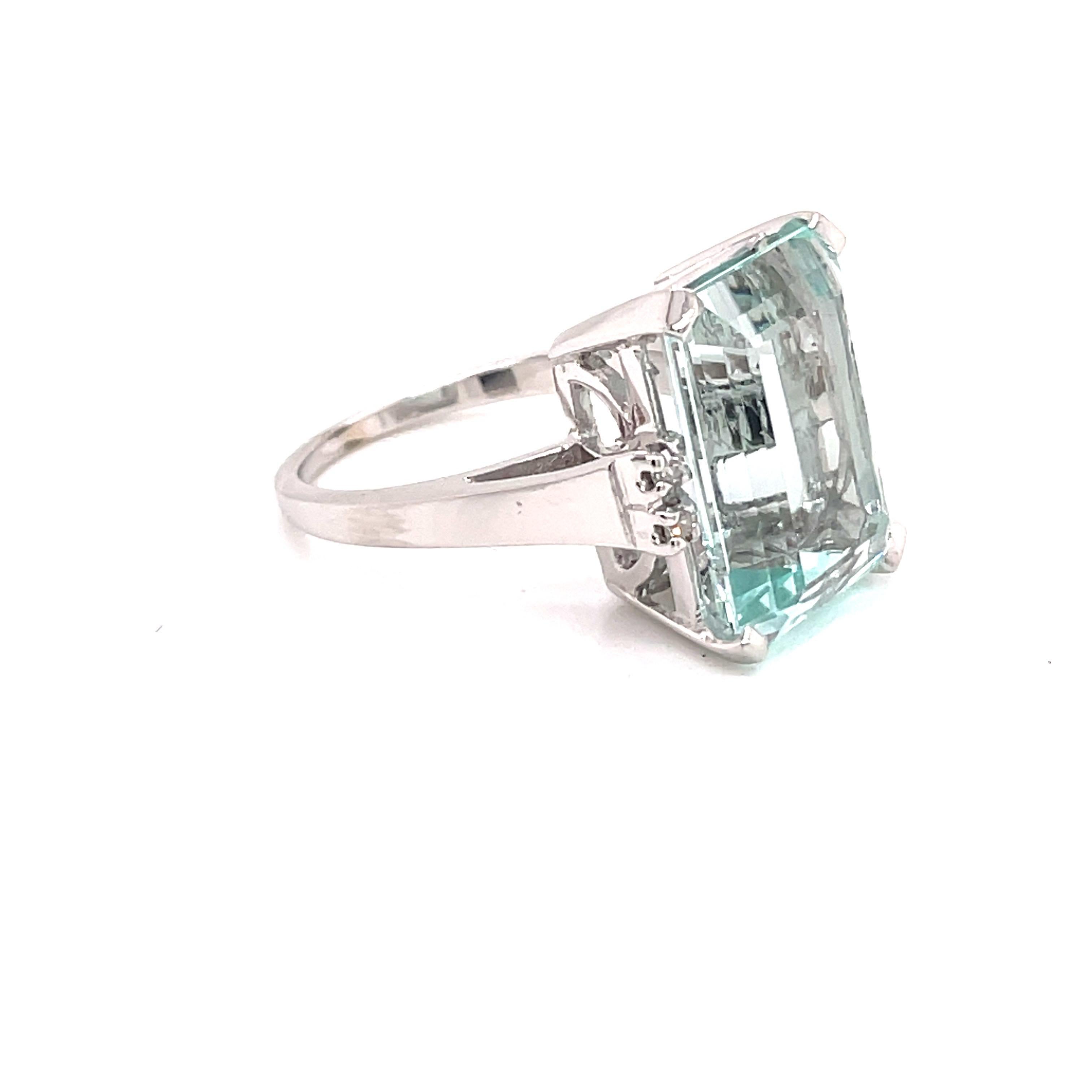Contemporary Vintage 1960's 10ct Emerald Cut Aquamarine Ring with Diamonds