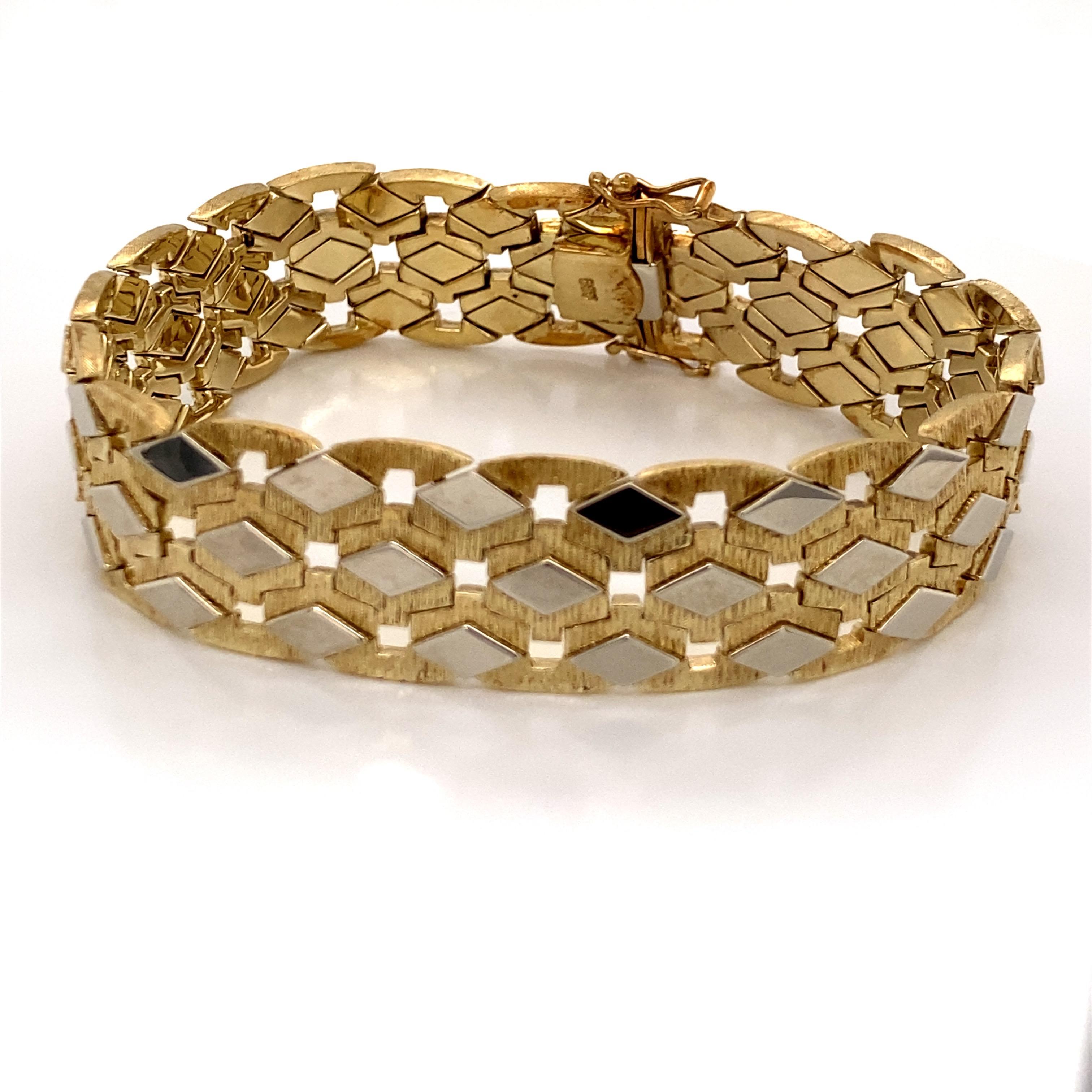 Vintage 1960's 14K Two Tone Gold Wide Retro Bracelet - The bracelet measure 7 3/4 inches long and 1/2 inches wide. It features a diamond pattern in white gold links over a yellow gold base. There is a hidden clasp with a double figure 8 safety for