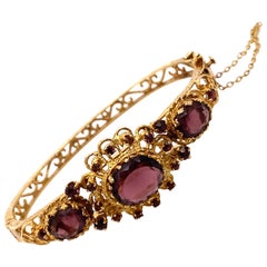Retro 1960's 14K Yellow Gold Bangle Bracelet with Purple Stones