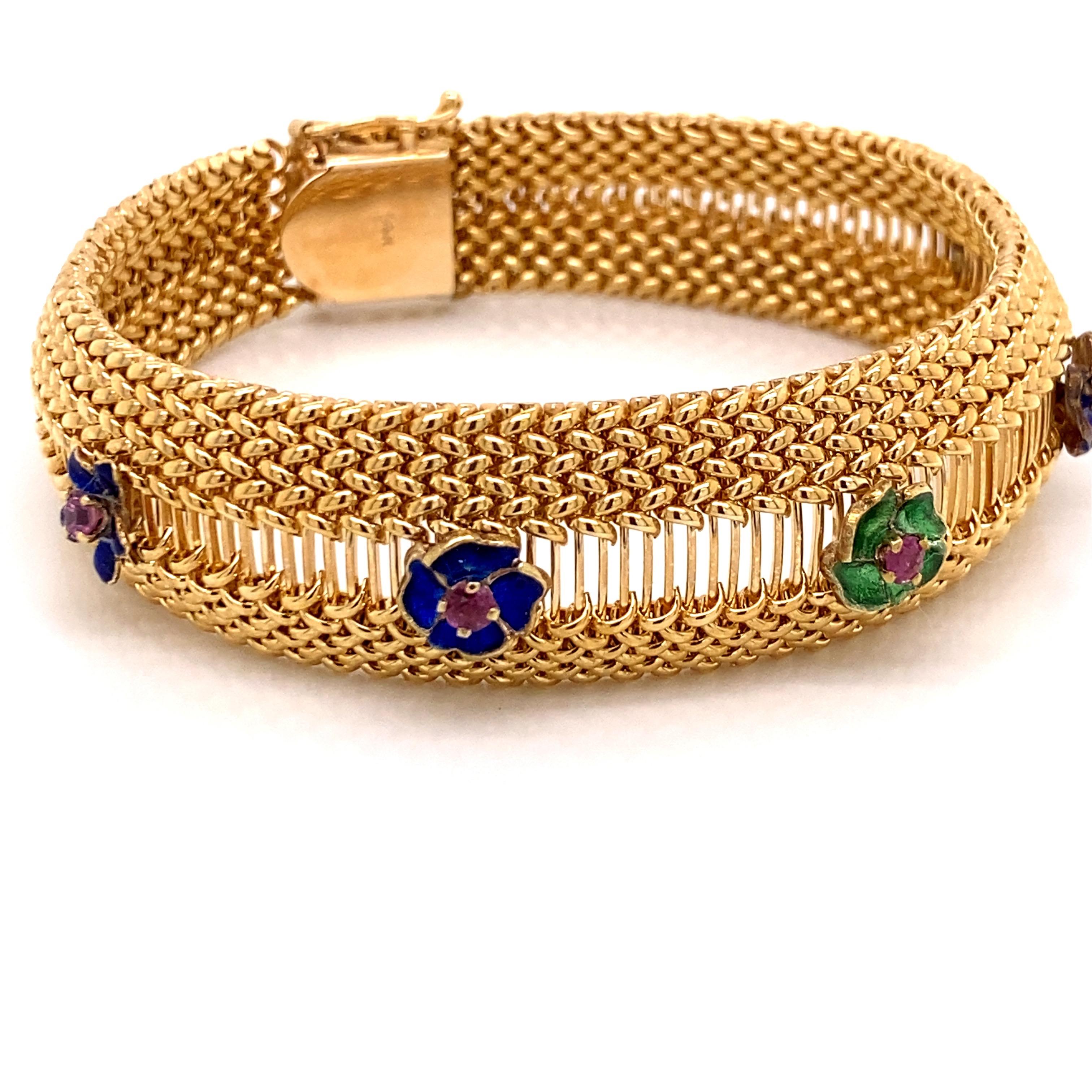 Vintage 1960s 14K Yellow Gold Mesh Bracelet with Enamel Flowers and Rubies - The bracelet measures 7.5 inches long and .75 inches wide in the center. The five Rubies inside the blue and green enamel flowers weigh approximately .50ct. The bracelet