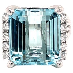 Vintage 1960
s 17ct Emerald Cut Aquamarine Ring with Diamonds