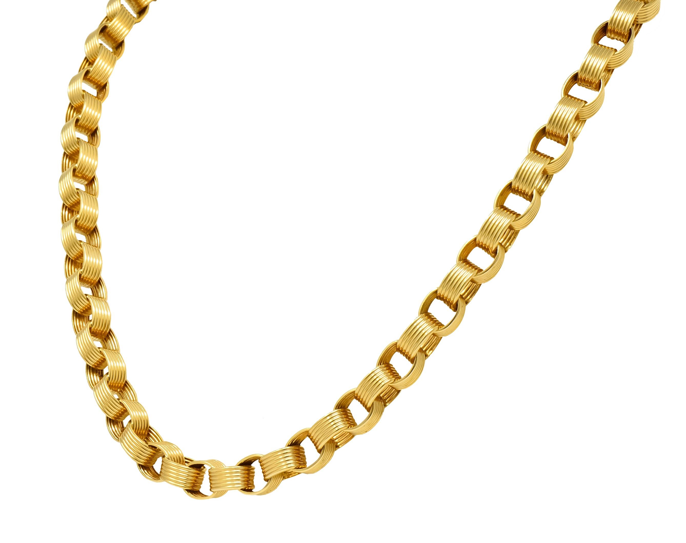 Rolo style chain comprised of large, deeply ridged links

With a bright polished finish

Completed by lobster clasp

Stamped 18ct for 18 karat gold

Length: 26 inches

Width: 3/8 inch

Total weight: 88.9 grams

Fearless. Golden. Significant.

