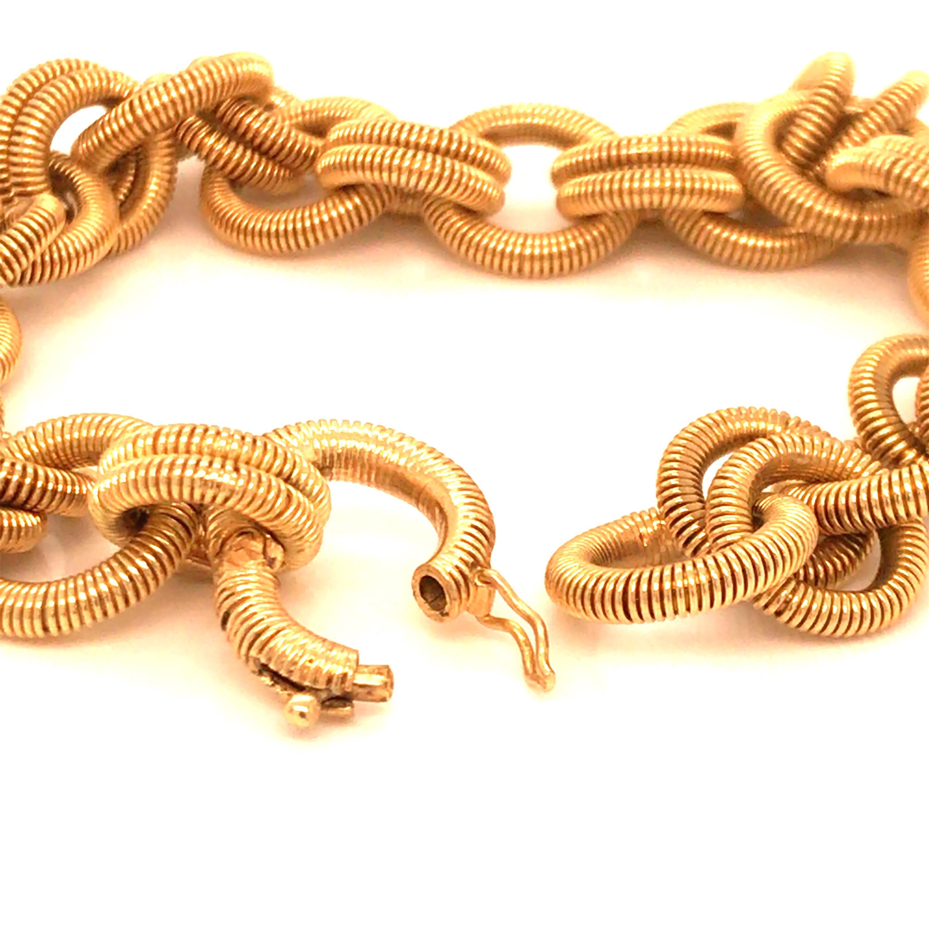Modern Vintage 1960s 18 Karat Yellow Gold Coiled Link Bracelet For Sale