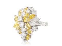 Vintage 1960s 2.00 Carat Yellow Diamonds and 3.00 Carat White Diamonds Ring