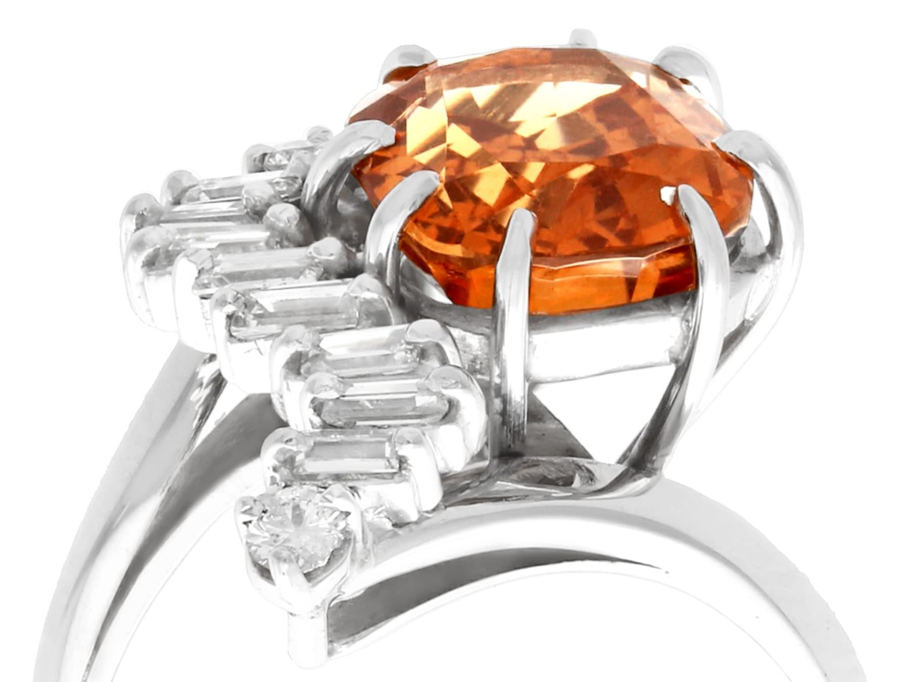 A stunning, fine and impressive 5.29 carat hessonite garnet and 0.52 carat diamond, 18 karat white gold twist style dress ring; part of our diverse gemstone jewelry collections.

This stunning, fine and impressive gemstone ring has been crafted in