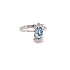 Vintage 1960's .75ct Oval Cut Aquamarine Ring with Diamonds