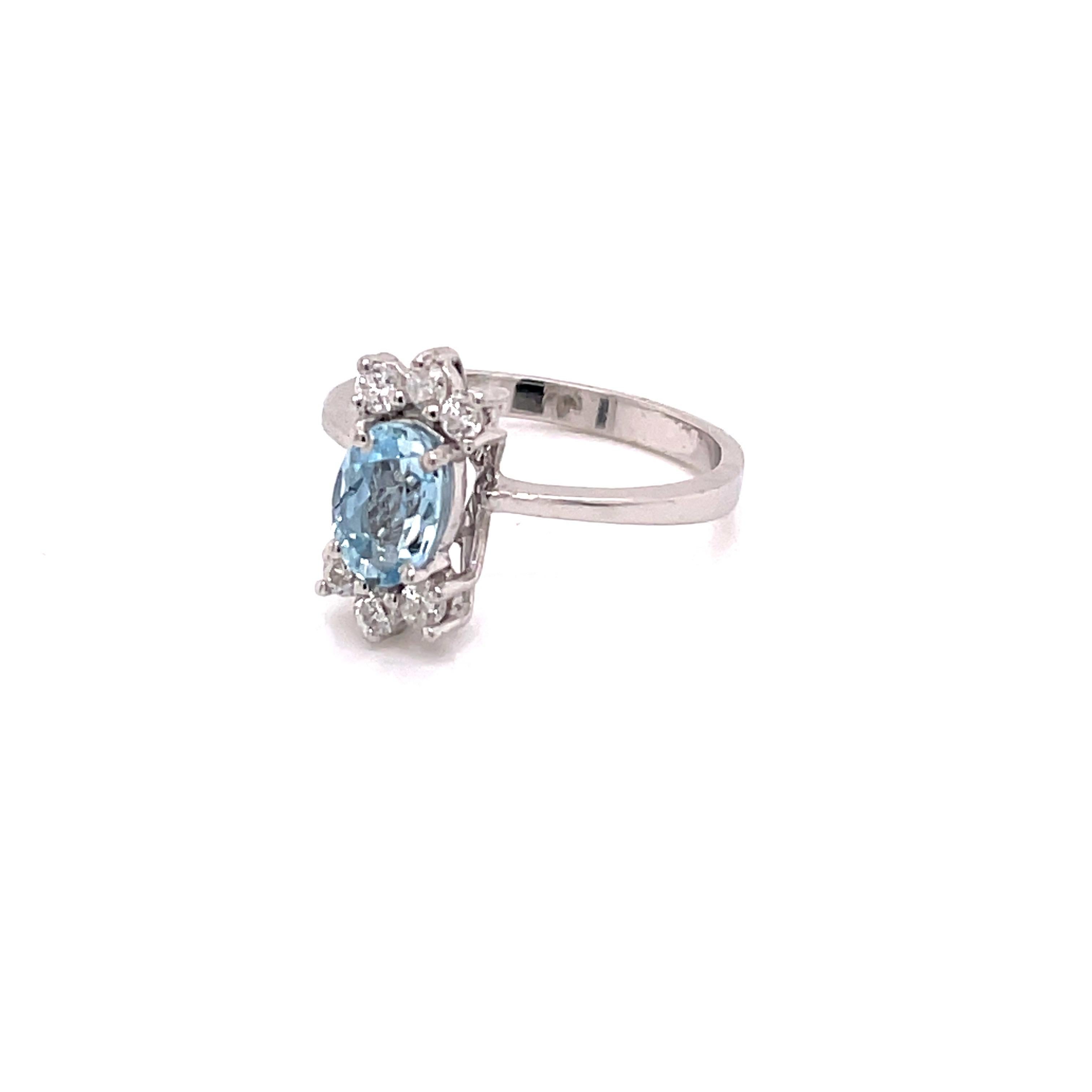 Vintage 1960's .75ct Oval Cut Aquamarine Ring with Diamonds In Good Condition For Sale In Boston, MA