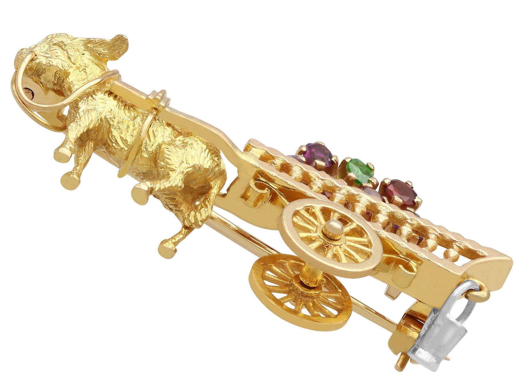 A fine and impressive vintage 0.30 carat (total) amethyst, garnet and peridot, 9 karat gold donkey and cart brooch; part of our diverse vintage jewelry and estate jewelry collections.

This fine and impressive vintage brooch has been crafted in 9k