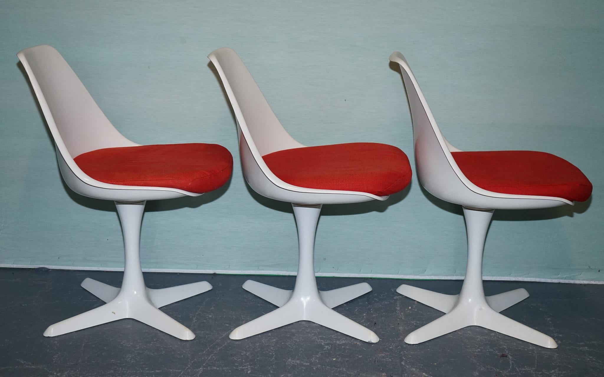 
Antiques of London



A striking set of five Arkana 115 Tulip swivel chairs, designed in the 1960s by Maurice Burke, showcases the sleek elegance of mid-century modern style. These collectable chairs feature a sculpted white fibreglass seat shell