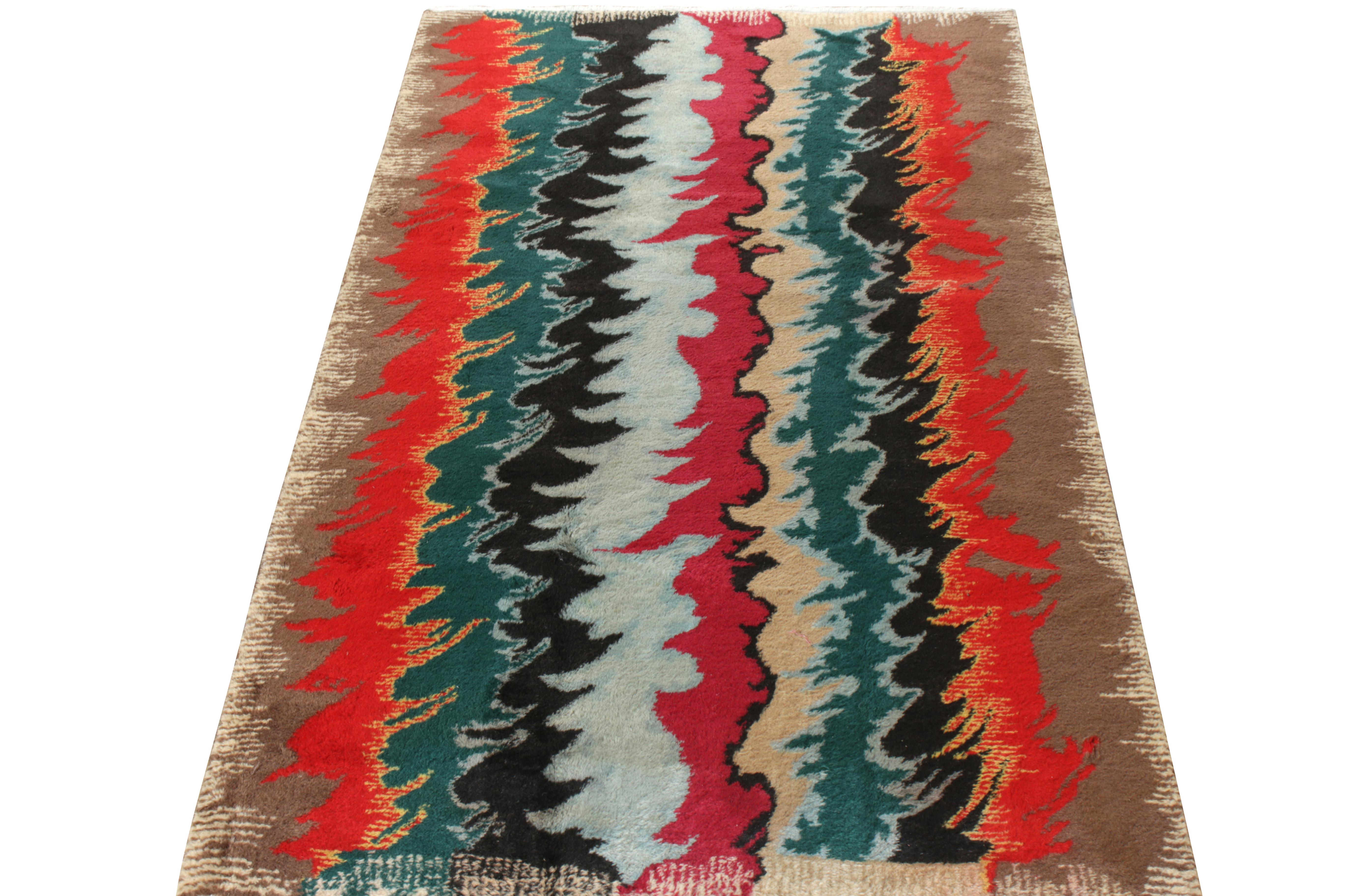 Rug & Kilim takes pride in presenting this glorious vintage 4x7 rug addition to its Mid-Century Pasha Collection, which includes handpicked pieces of the revered Turkish designer Zeki Muren. Featuring one of his most revered themes in a very