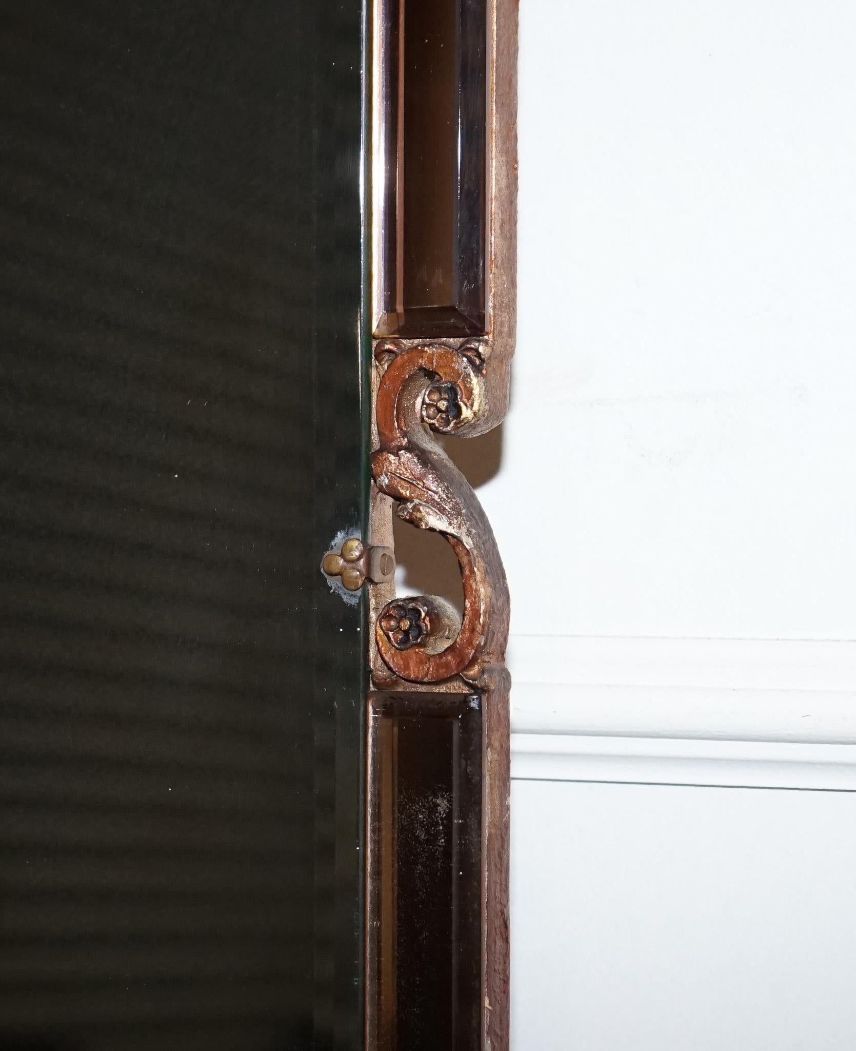 
Antiquariato di Londra


Un sorprendente specchio da parete vintage di Atstonea, risalente agli anni '60 e progettato nell'elegante stile Art Deco revival. 

I toni caldi del pesca e il design geometrico evocano il glamour e la raffinatezza