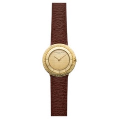 Audemars Piguet Volante vintage des années 1960, or jaune 18 carats, cadran à damier, remontage manuel, 32 mm