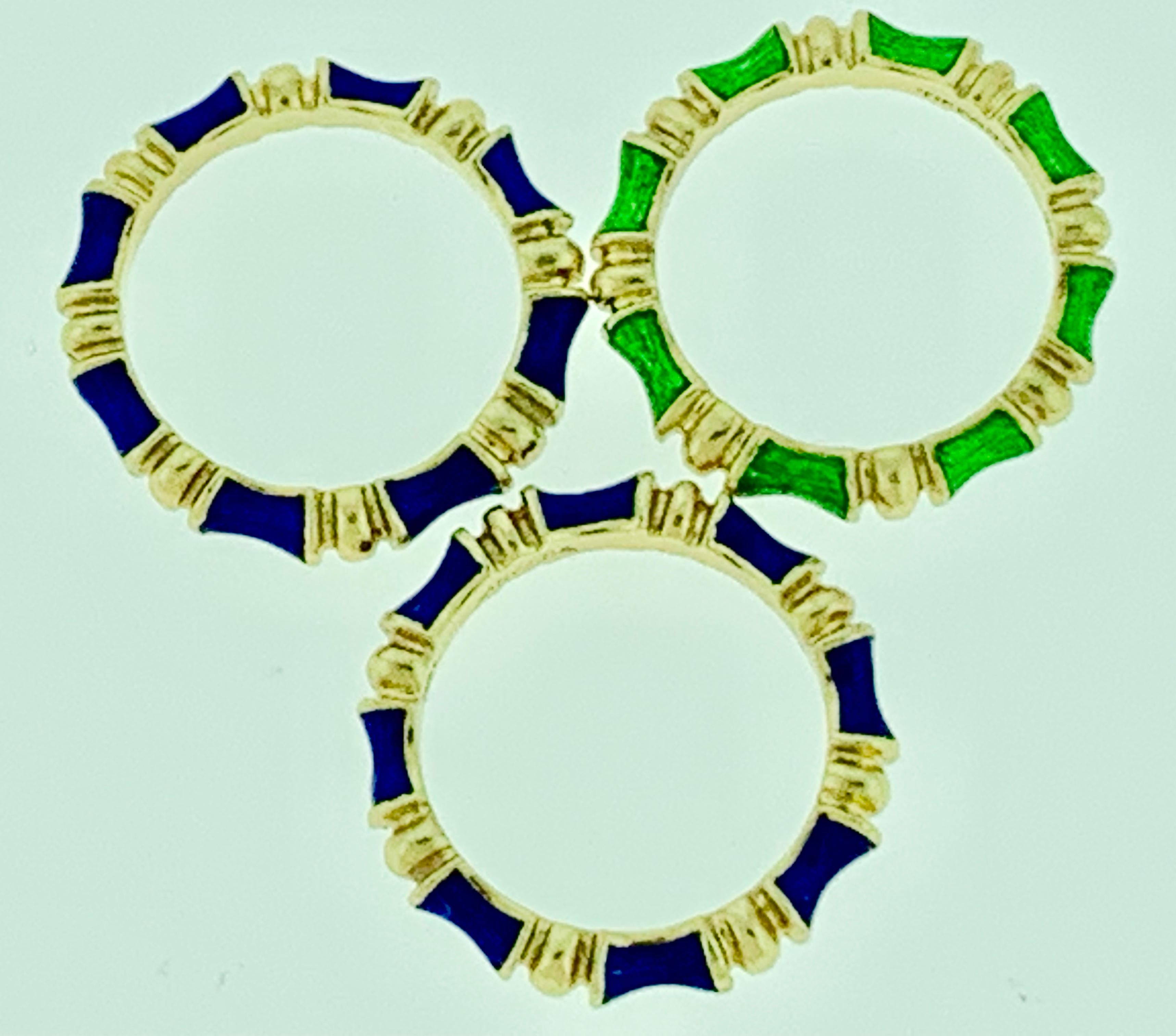 Vintage 1960s Bamboo Tiffany & Co   Schlumberger Two Blue one Green Enamel  set of 3 bands
An exquisite vintage Tiffany & Co blue  and Green enamel bamboo ring band set . The condition of the enamel in all the band is  superb 
Blue enamel you can