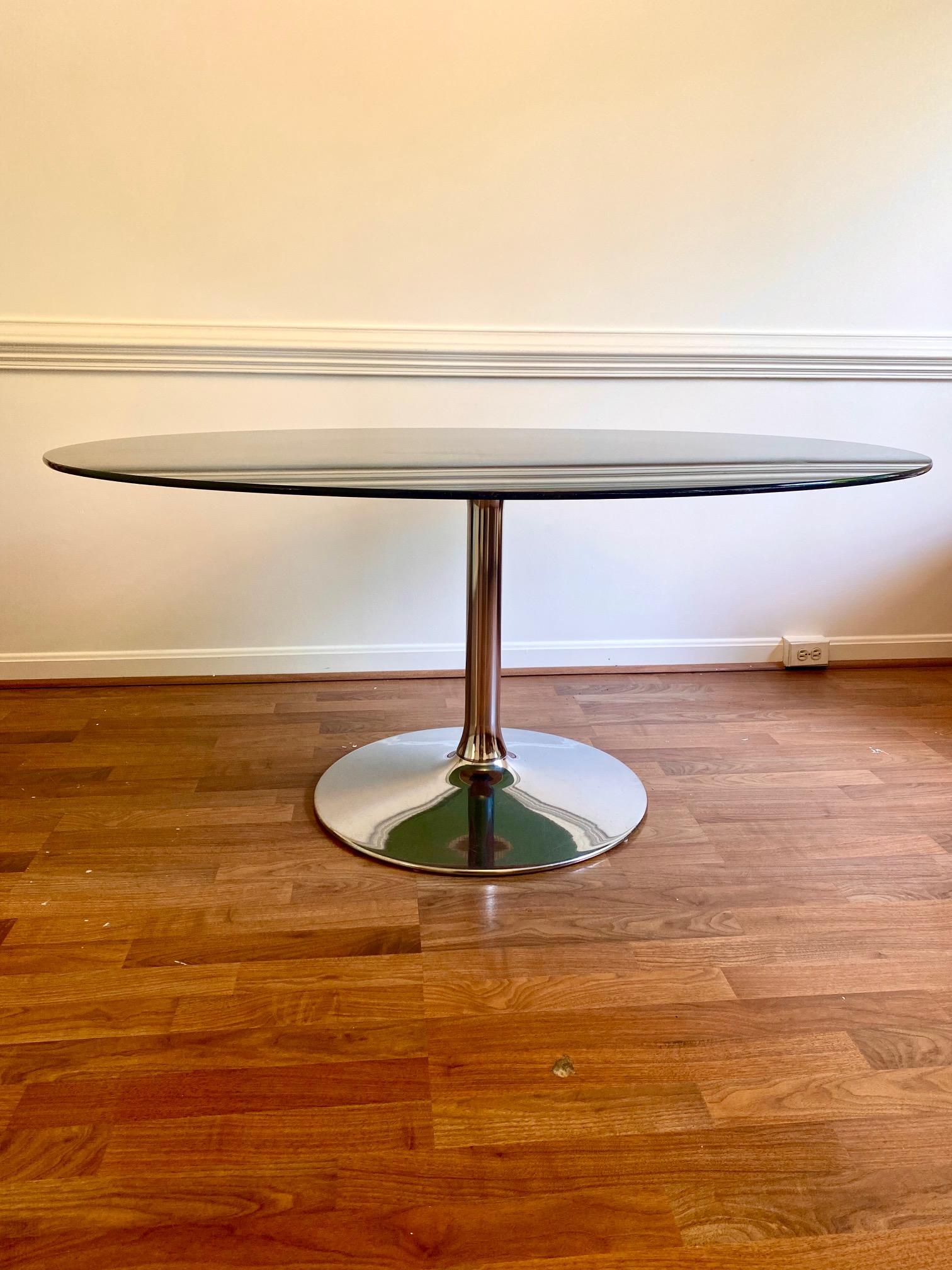 oval smoked glass dining table