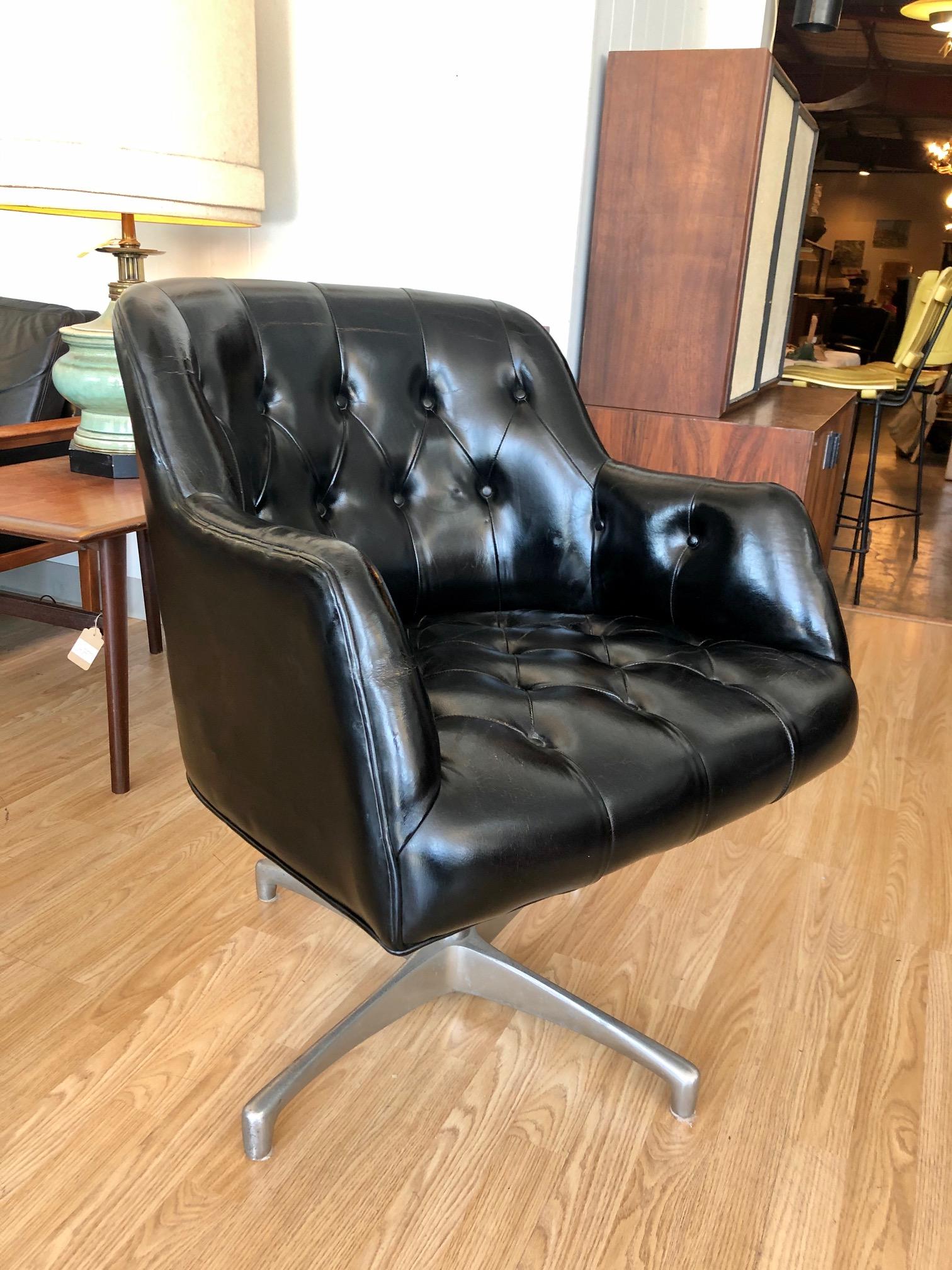 vintage black leather swivel chair