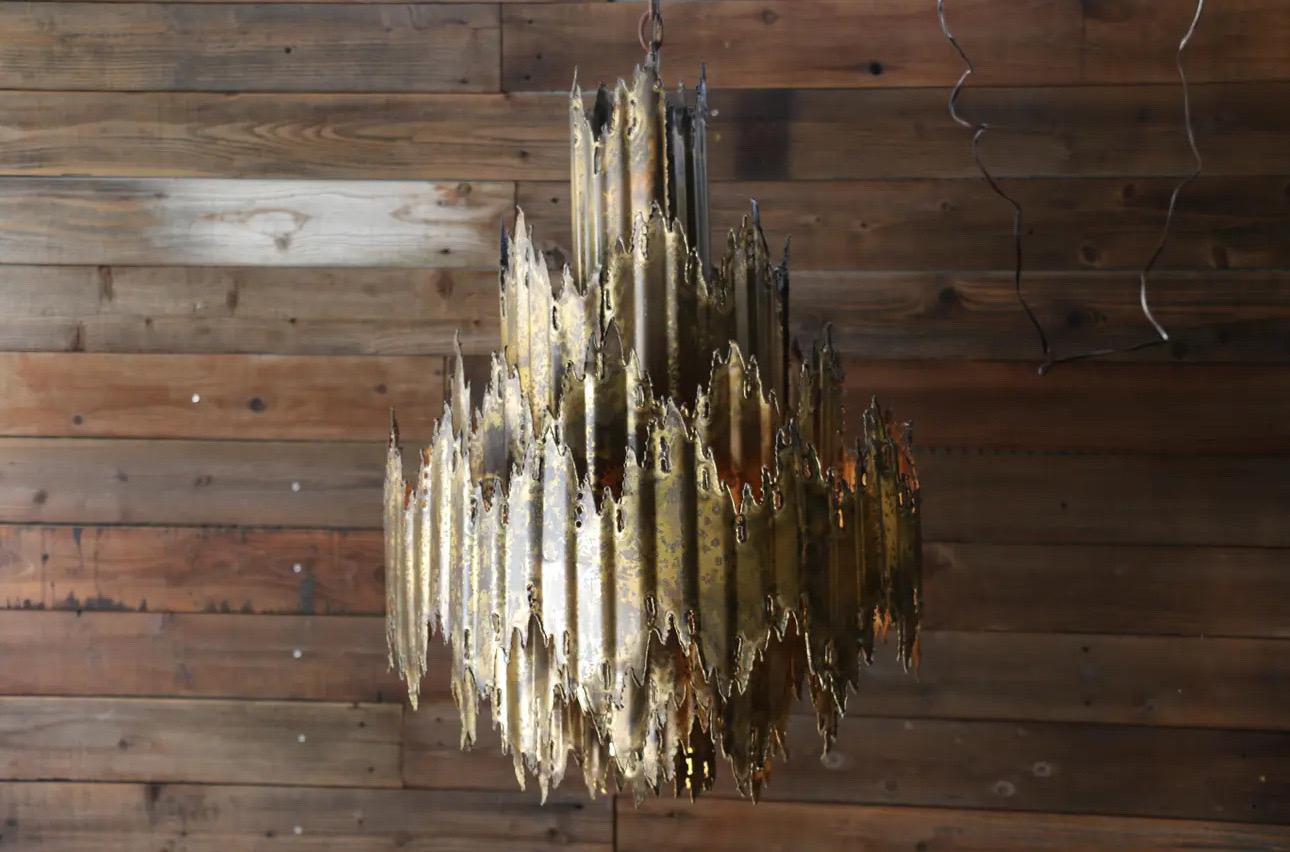 Amazing vintage chandelier designed by Tom Greene for Feldman Co., circa 1960s. In good working condition. It has original patina. Just a wonderful piece hard to find.