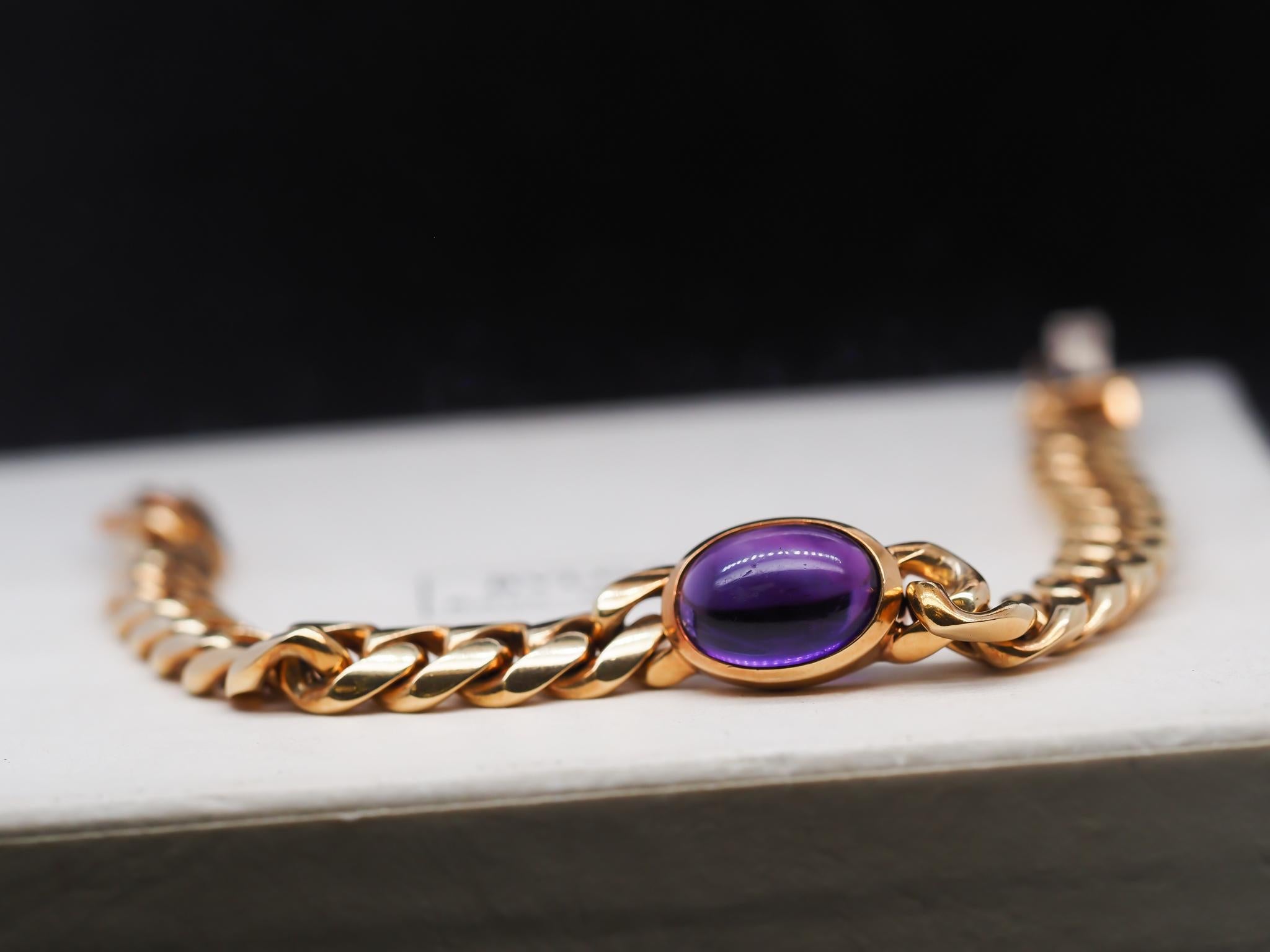 Year: 1960s
Item Details:
Metal Type: 18K Yellow Gold [Hallmarked, and Tested]
Weight: 44.3 grams (All Items Total)
Stone Details: Natural, Amethyst (No Treatments), 13.5mm x 10mm, Approximately 5 carat. Purple. Transparent.
*Clasp are marked with