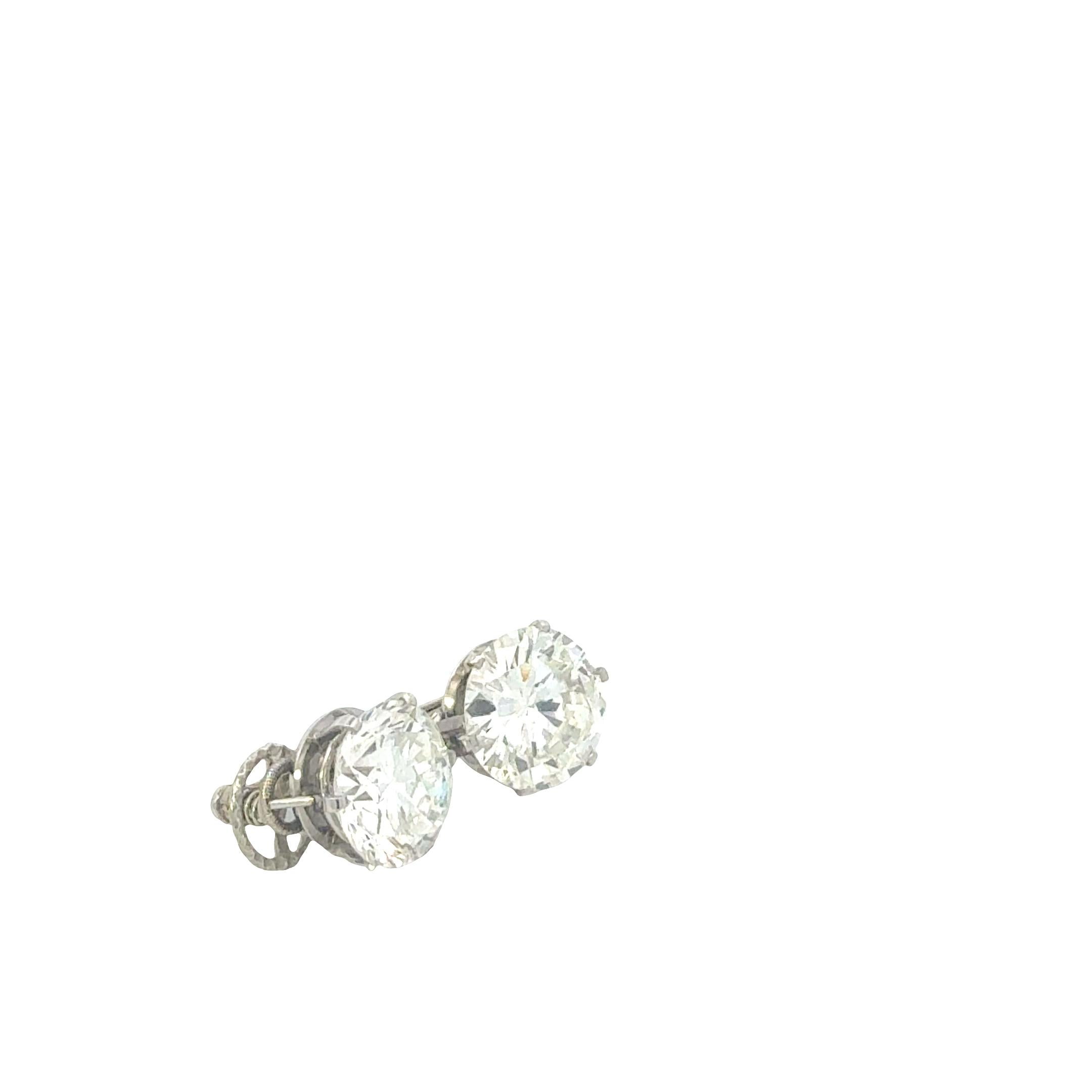 Femenino o masculino Vintage 1960s Bulgari Platinum Stud Earrings – 2 Round Diamonds, 5.00 & 5.32 cts en venta