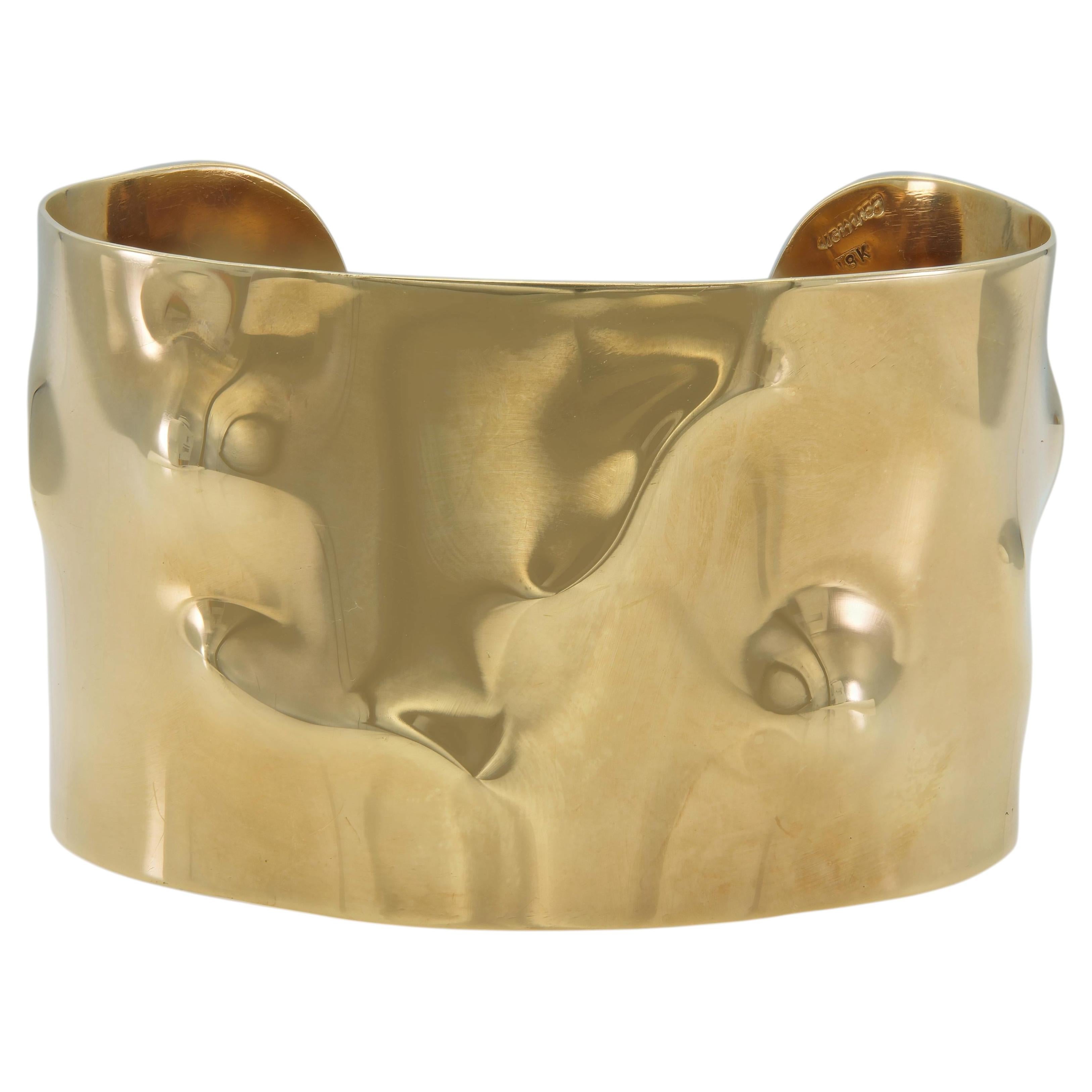 Bracciale a cuffia "Crumble" Cartier in oro, anni '60