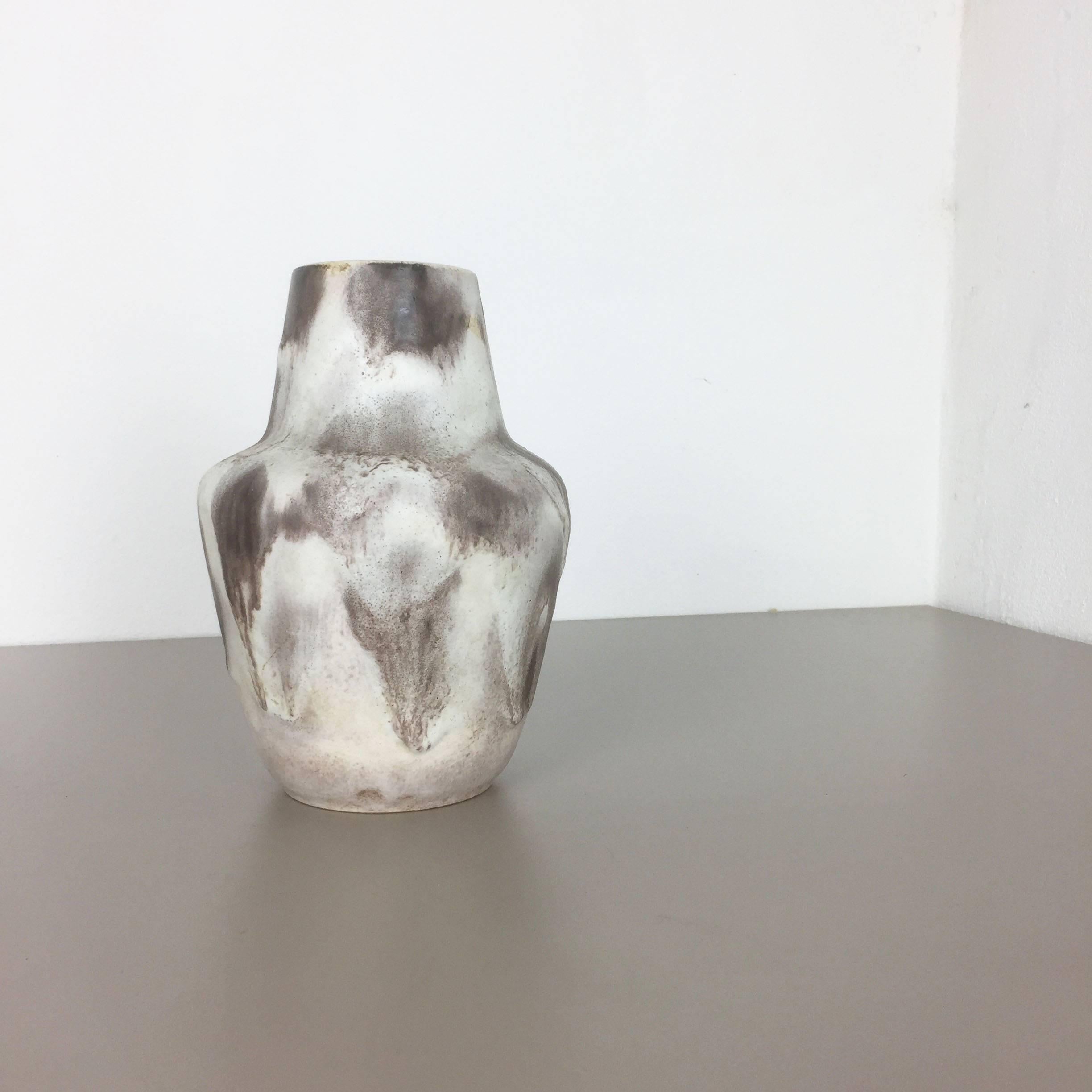 Article:

Pottery ceramic vase 

Fat Lava


Decade:

1960s


Origin:

Germany



Description:

Original vintage 1960s pottery ceramic vase in Germany. High quality german production with a nice abstract surface coloration. The