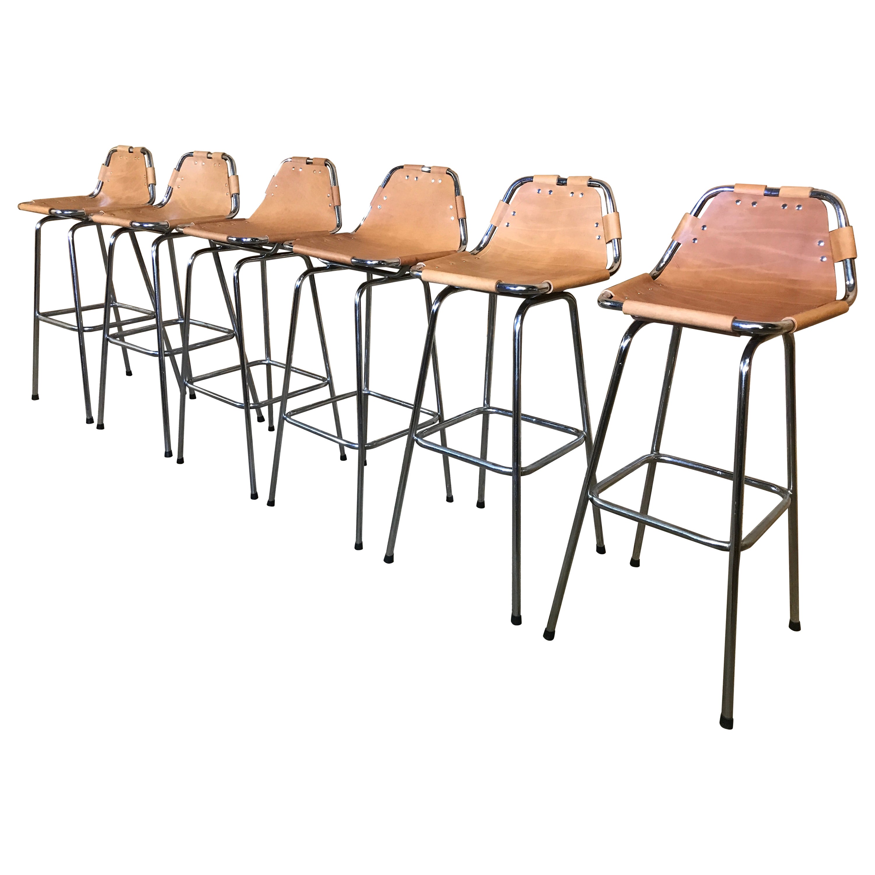 Vintage 1960's cognac colour Leather Stools by Charlotte Perriand for Les Arcs For Sale