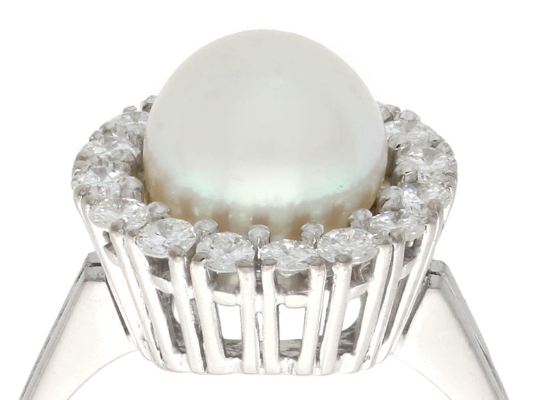 A fine and impressive cultured pearl and 0.65 carat diamond, 18 karat white gold cocktail ring; part of our diverse vintage jewelry collections

This fine and impressive diamond and pearl cluster ring has been crafted in 18k white gold.

The pierced