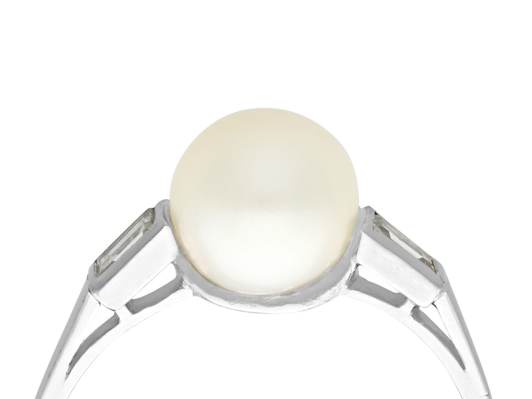 A fine and impressive cultured pearl and 0.18 carat diamond, 18 karat white gold dress ring; part of our diverse jewelry and estate jewelry collections.

This fine and impressive pearl and diamond ring has been crafted in 18k white gold.

The
